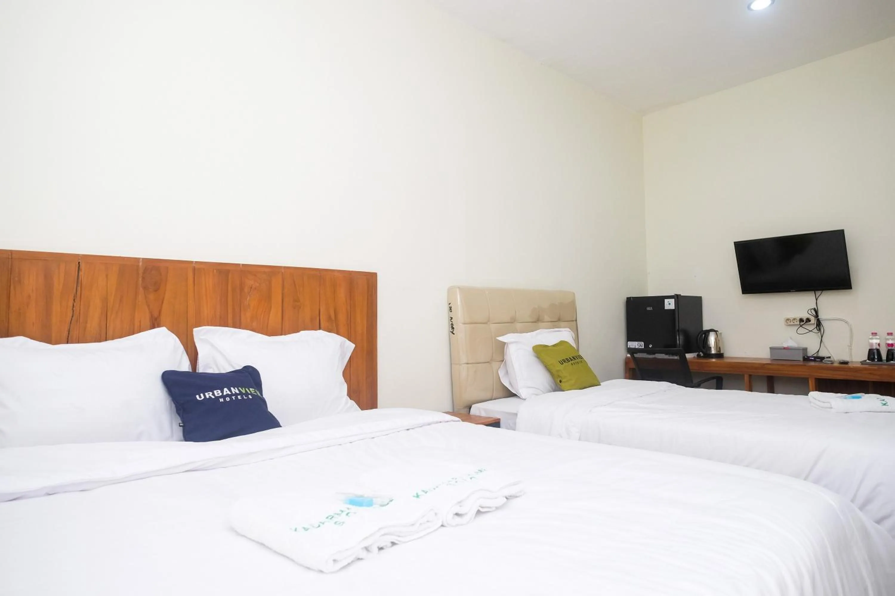 Bed in Urbanview Syariah Kadarman Home Laweyan by RedDoorz