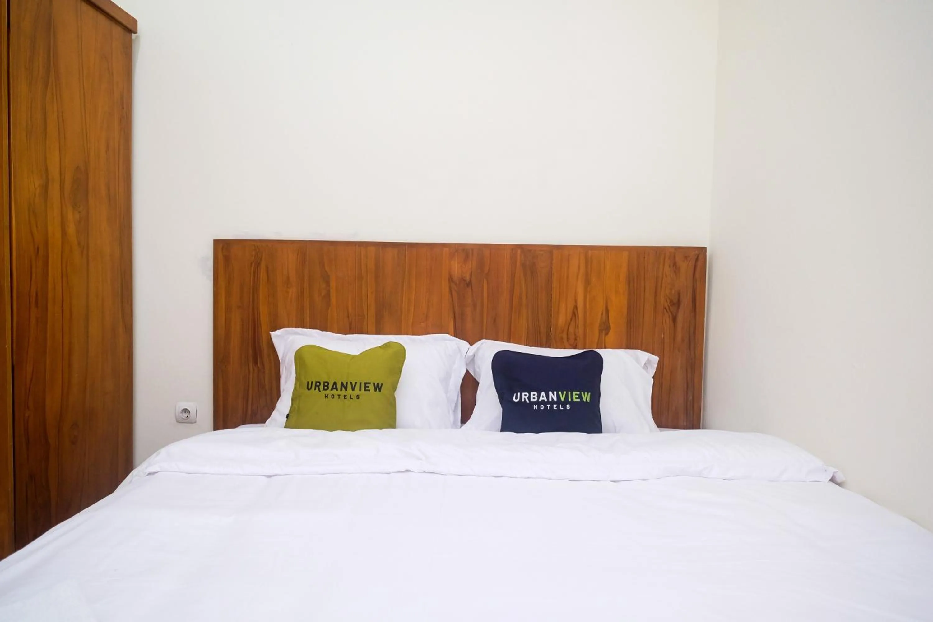 Bed in Urbanview Syariah Kadarman Home Laweyan by RedDoorz