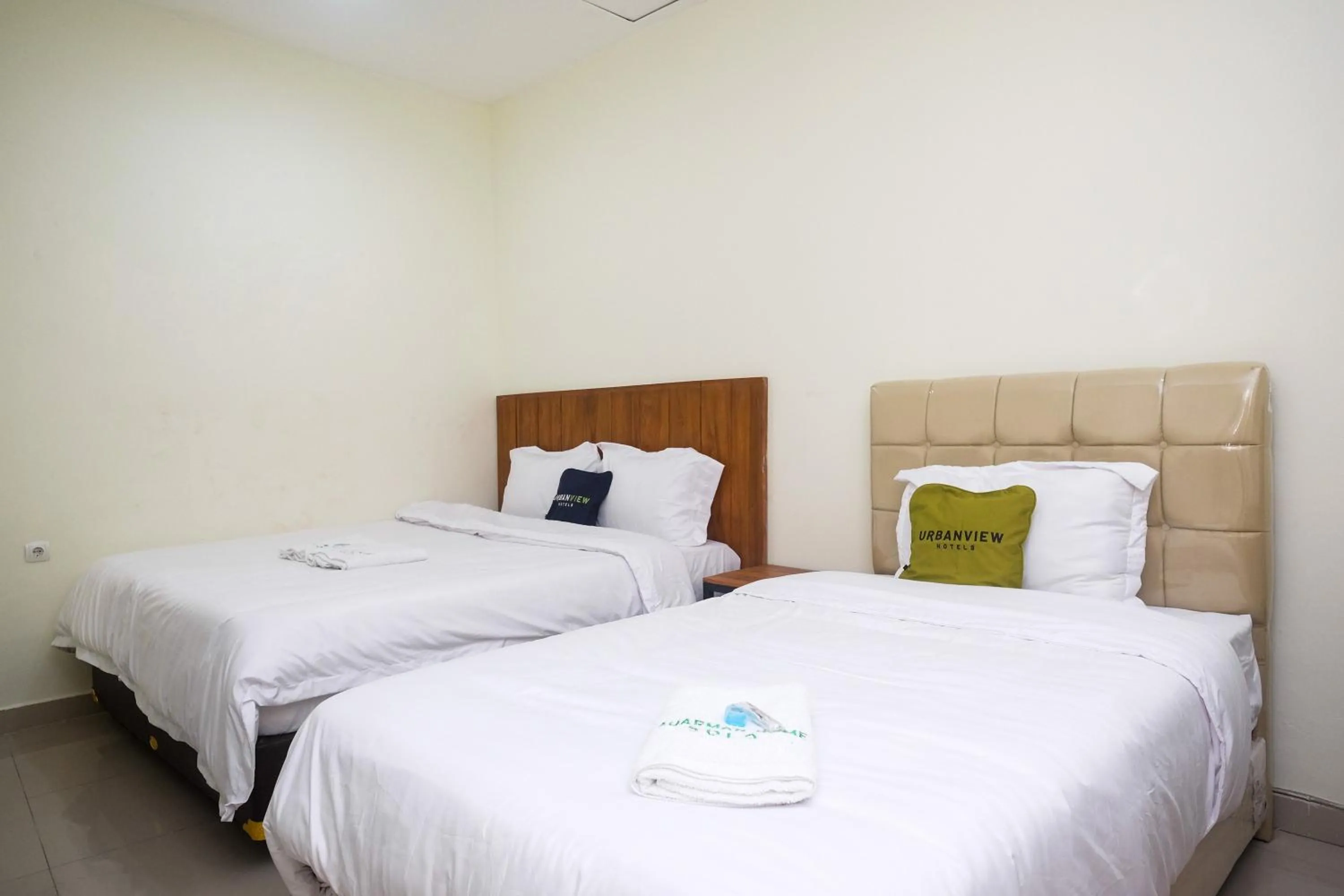 Bed in Urbanview Syariah Kadarman Home Laweyan by RedDoorz