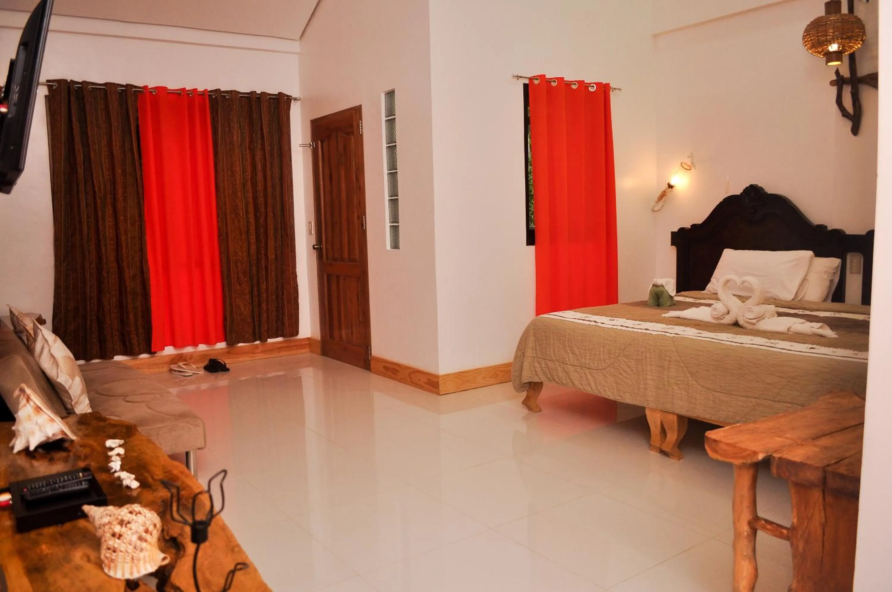 Photo of the whole room, Bed in Cocoloco Beach Resort