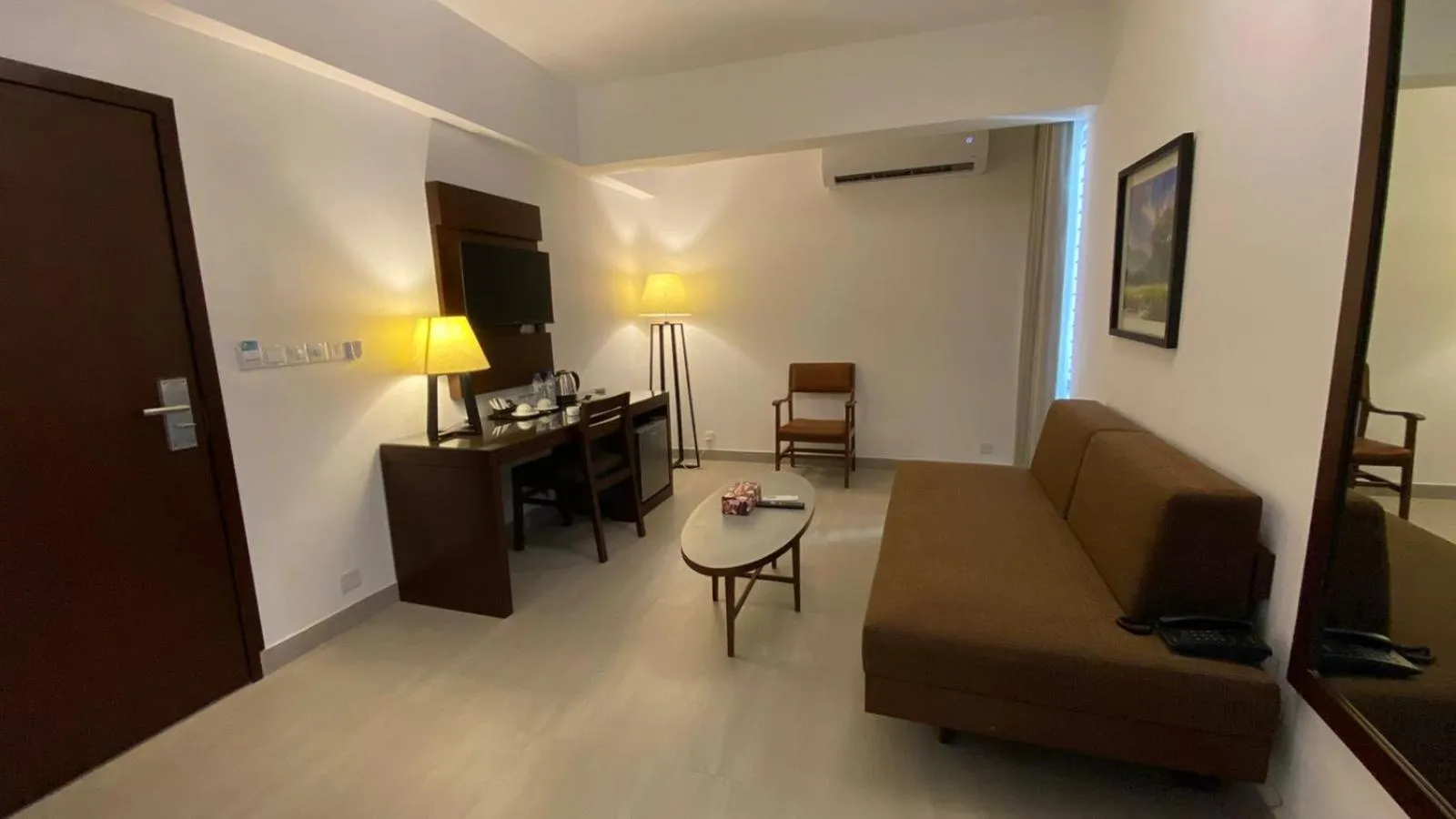 Seating area in Royal Pearl Suites