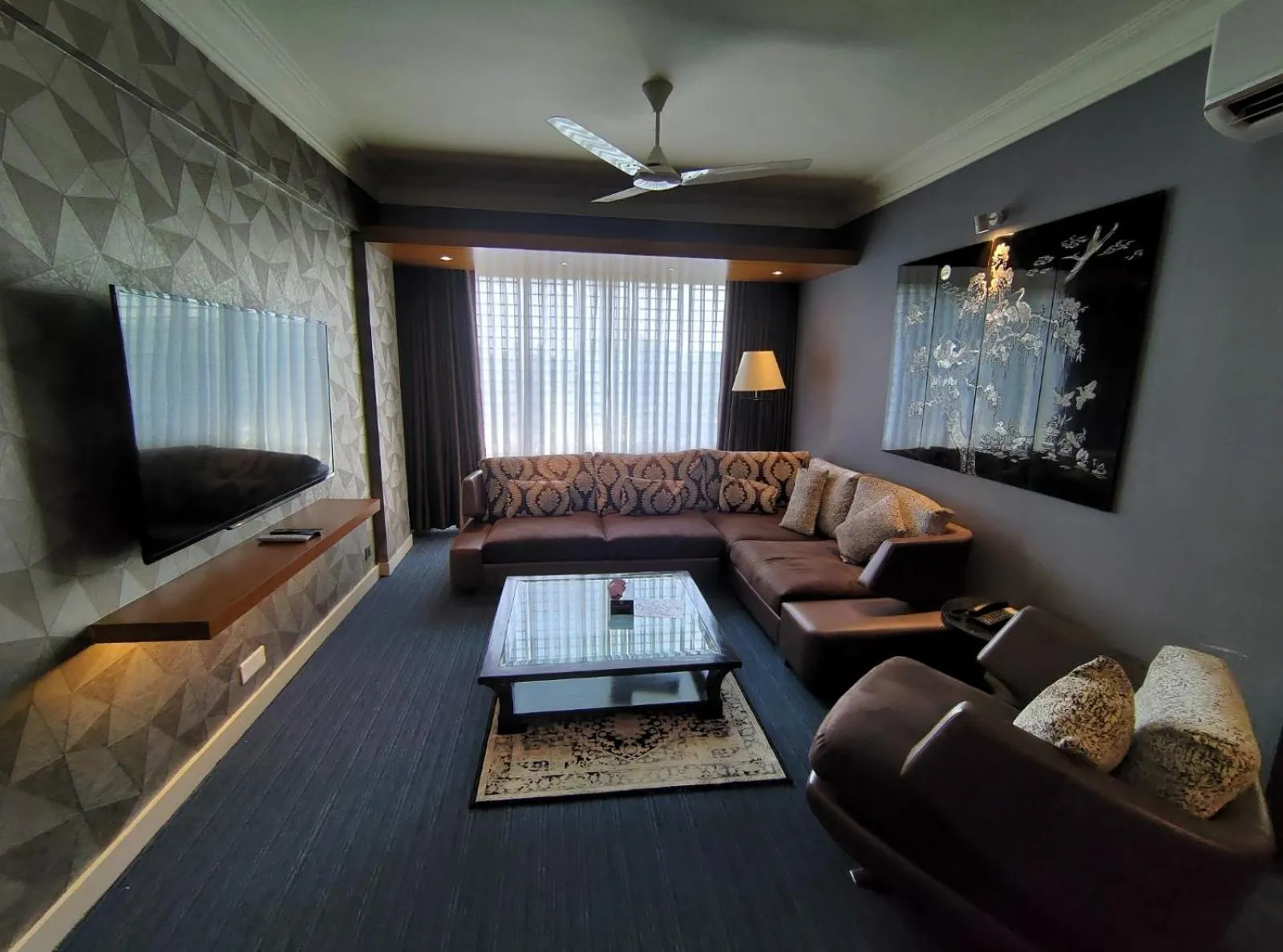 Seating area in Royal Pearl Suites