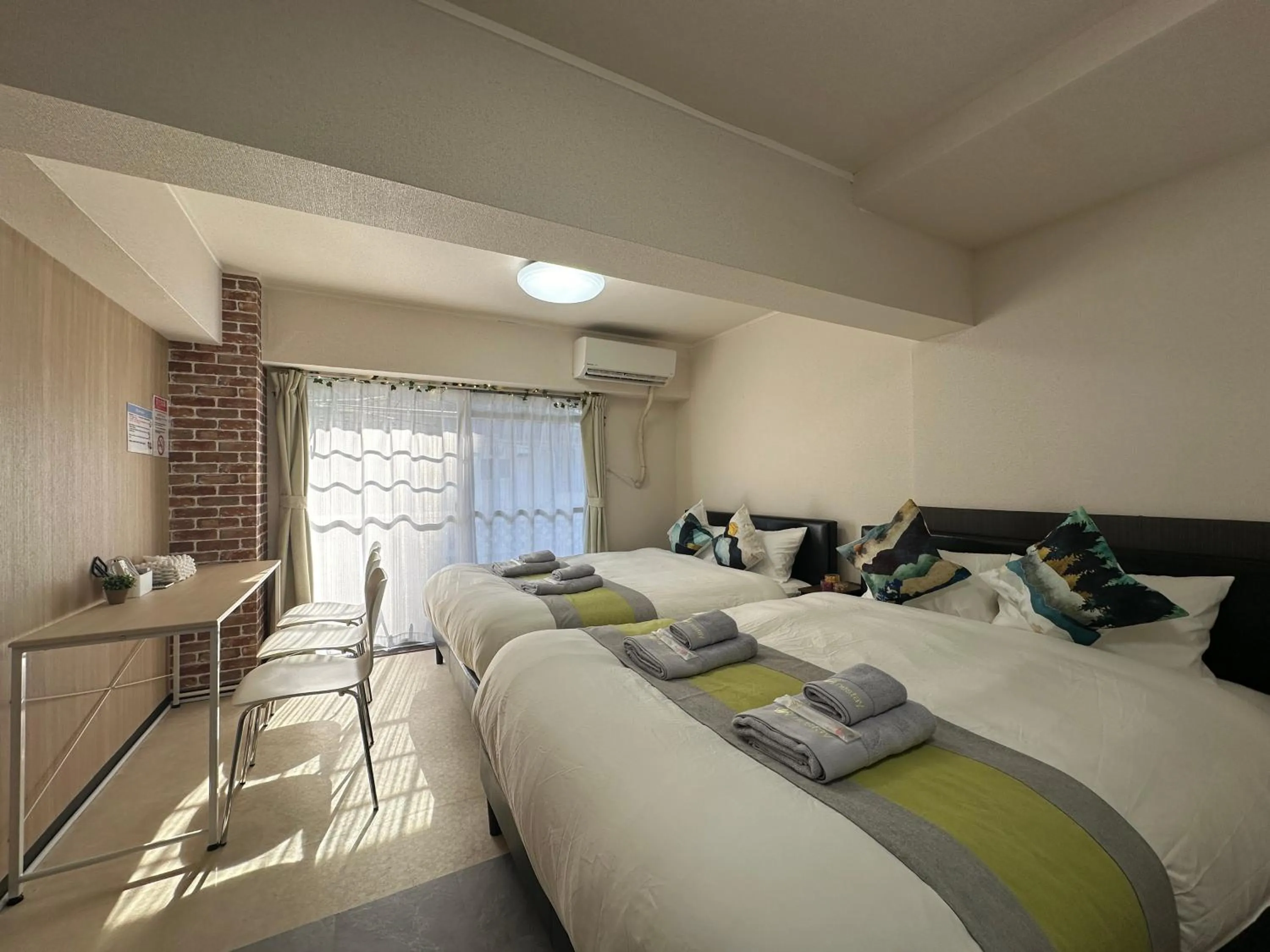 Bed in nestay apartment tokyo otsuka