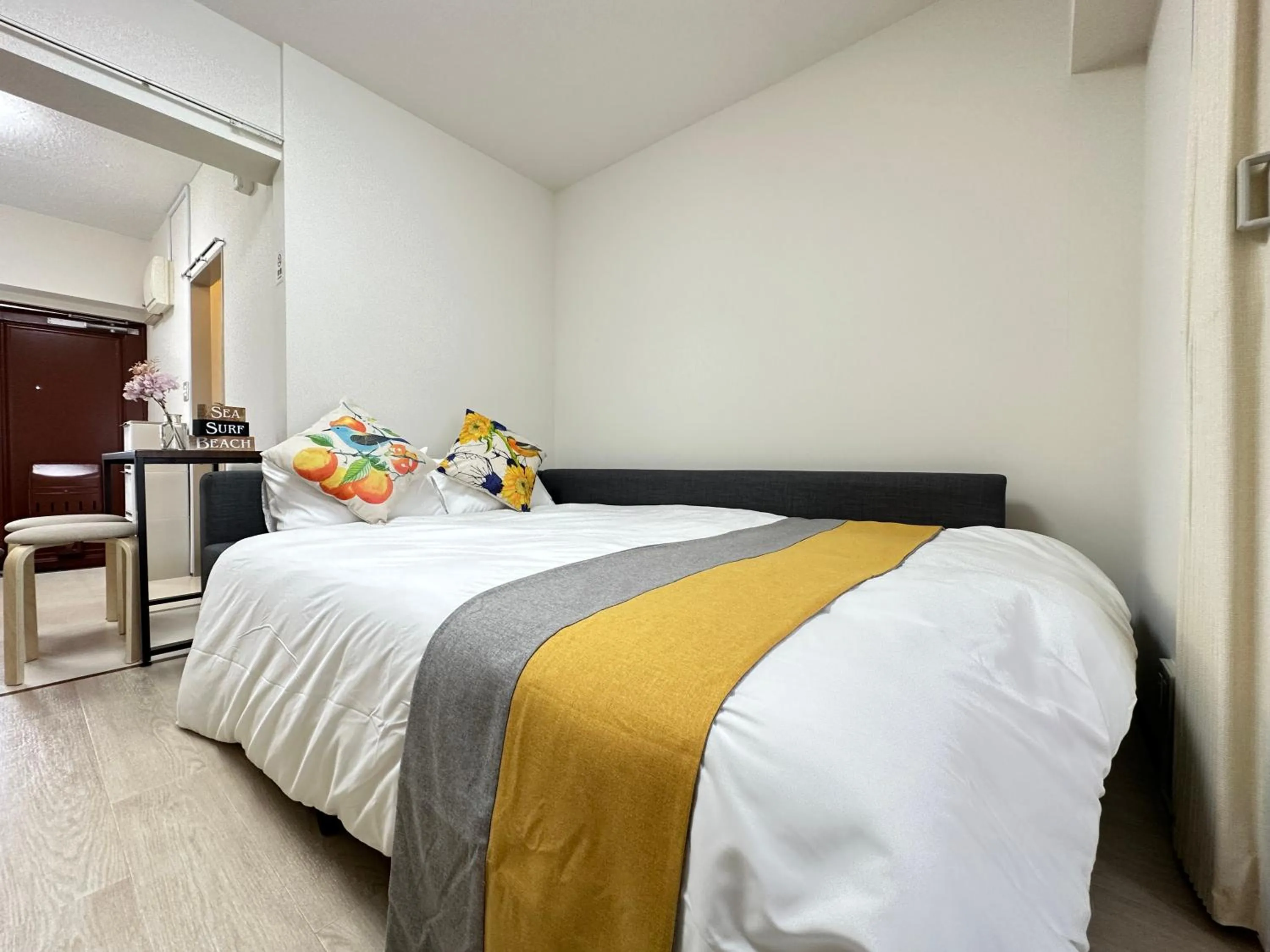 Bed in nestay apartment tokyo otsuka