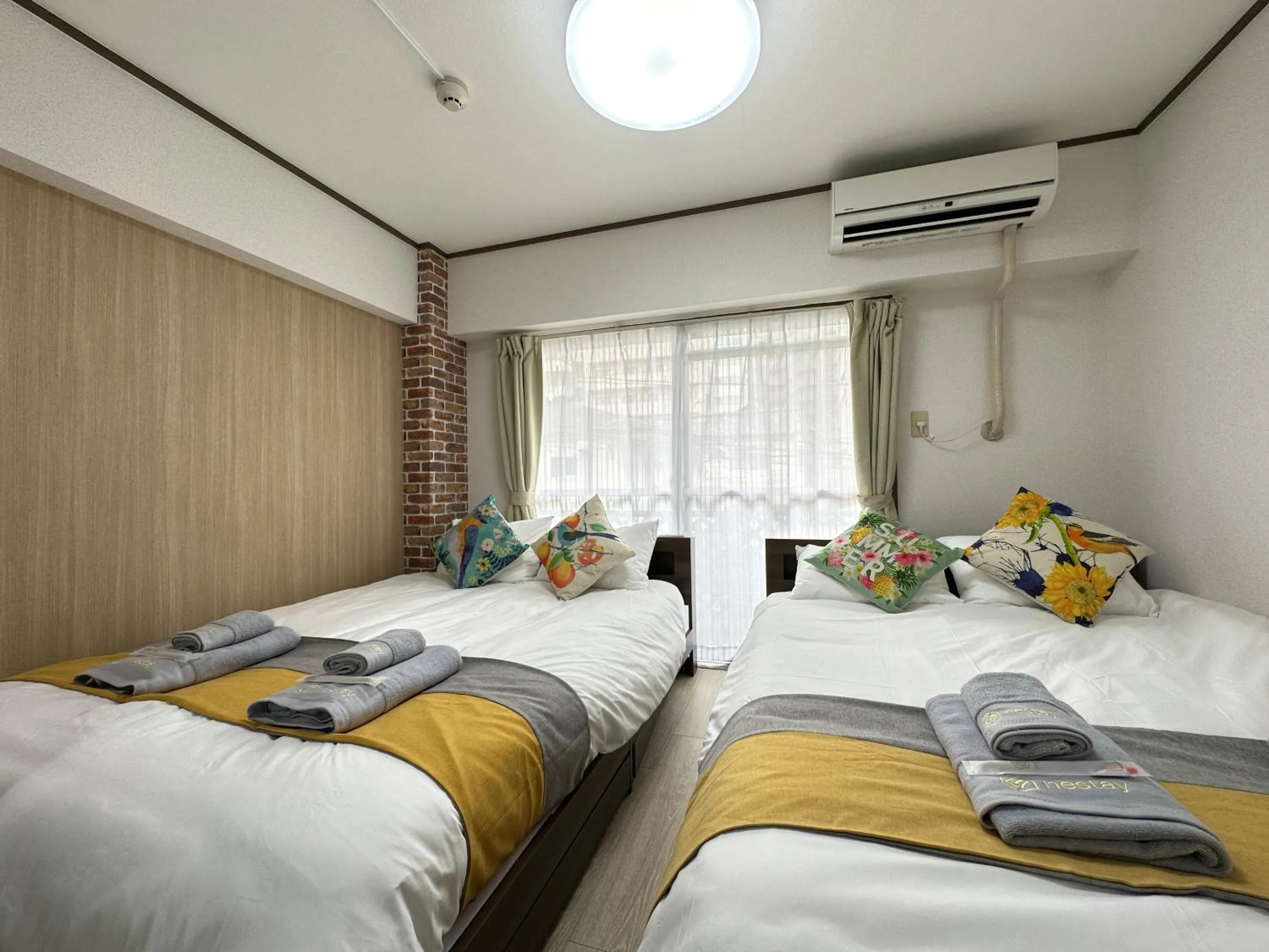 Bed in nestay apartment tokyo otsuka