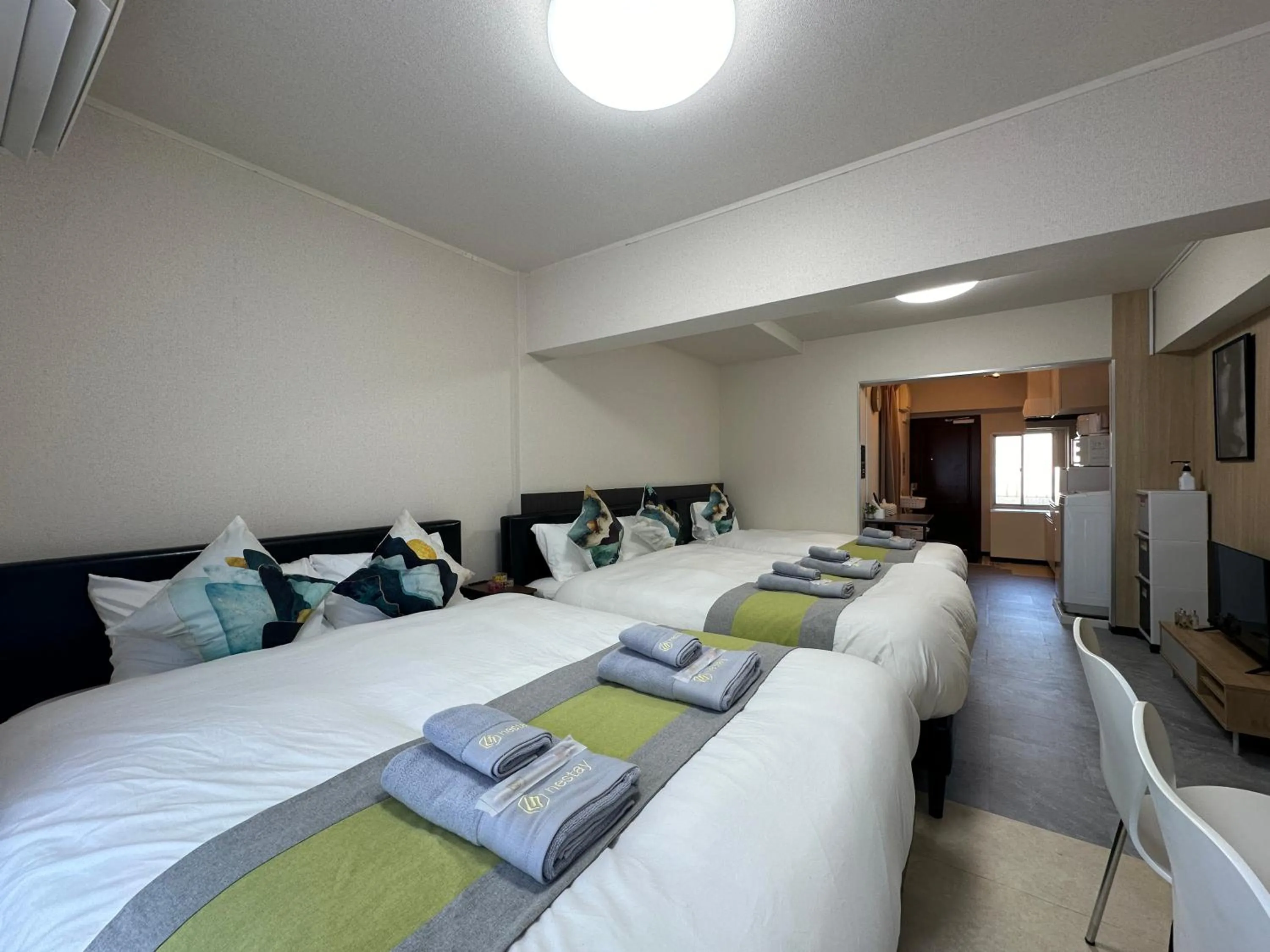 Bed in nestay apartment tokyo otsuka