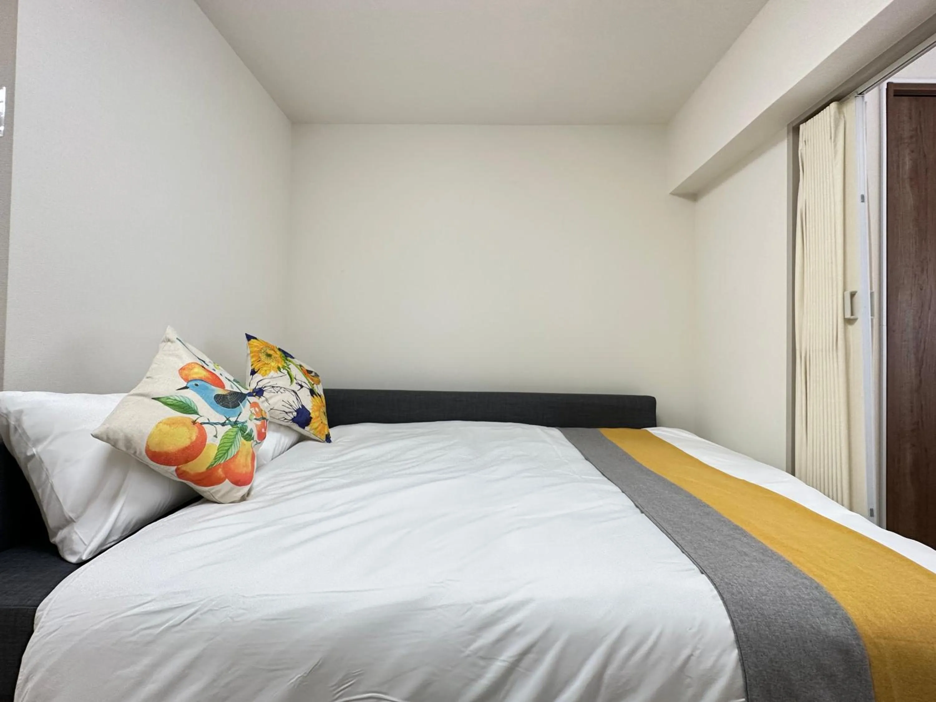 Bed in nestay apartment tokyo otsuka