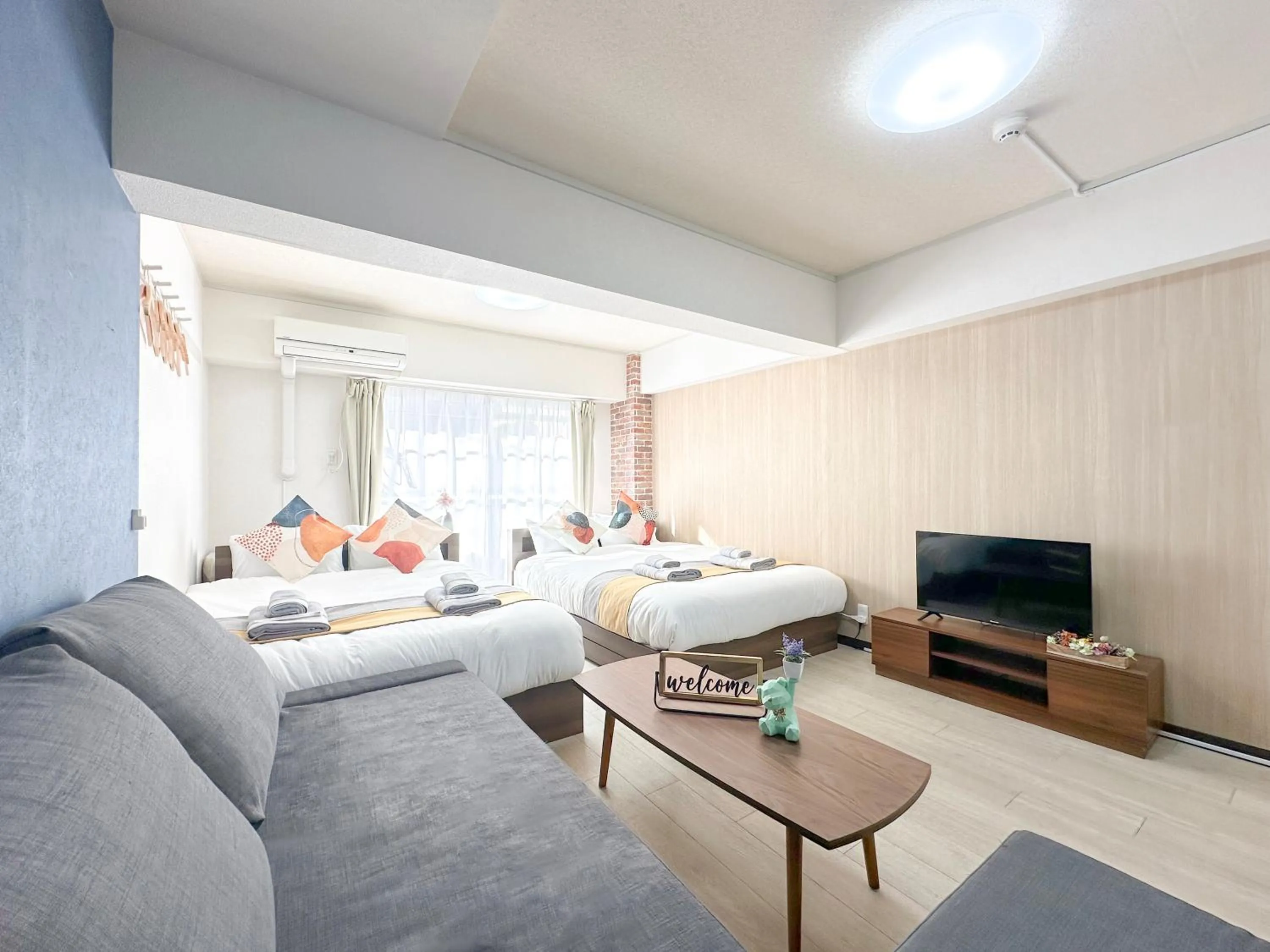 Bed in nestay apartment tokyo otsuka