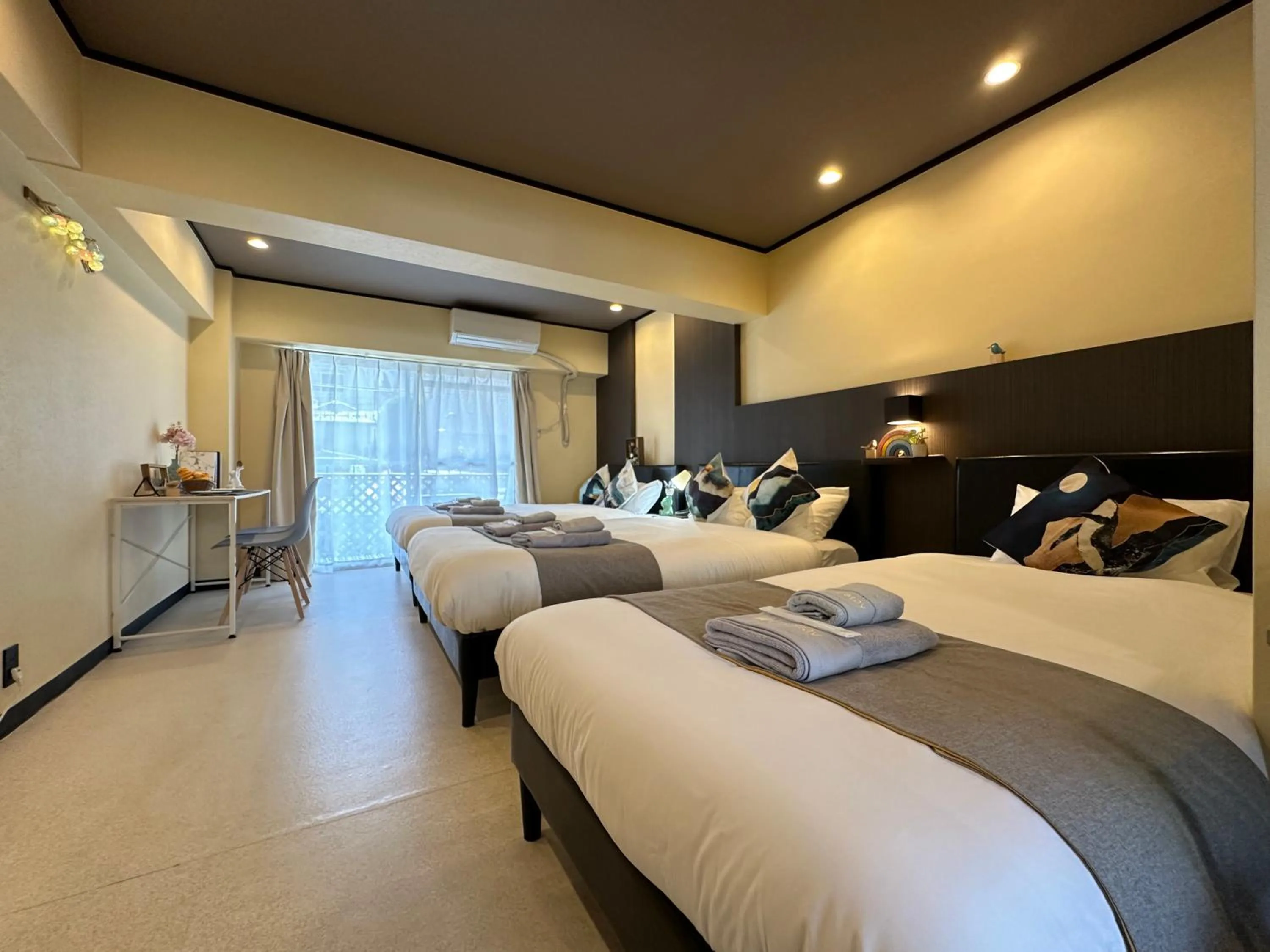 Bed in nestay apartment tokyo otsuka