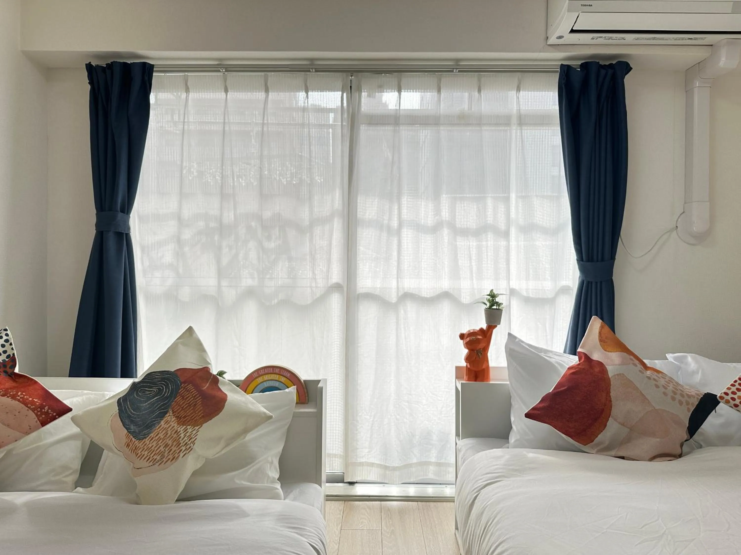 Bed in nestay apartment tokyo otsuka