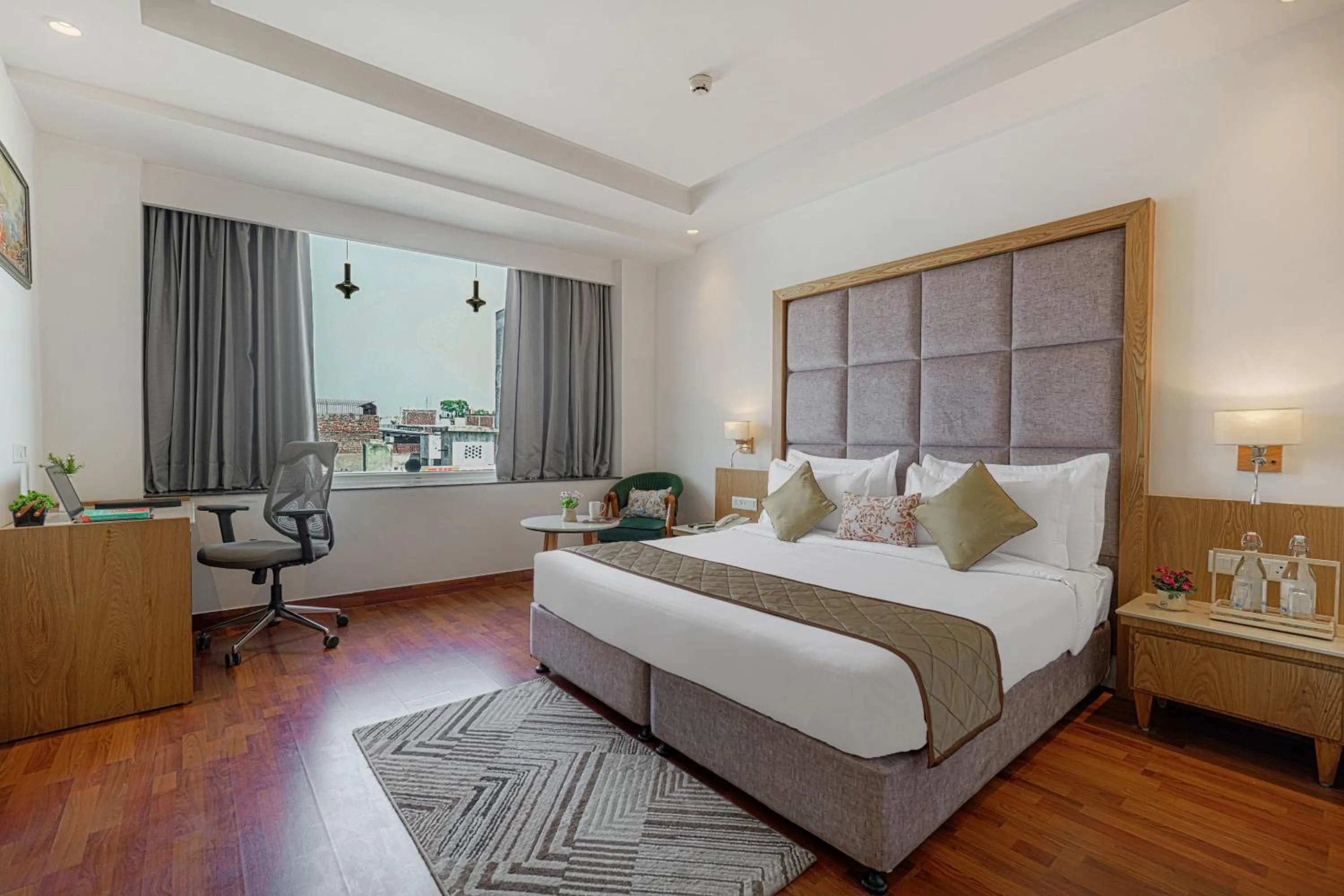 Bedroom in Quality Inn Elite Levelup Boutique