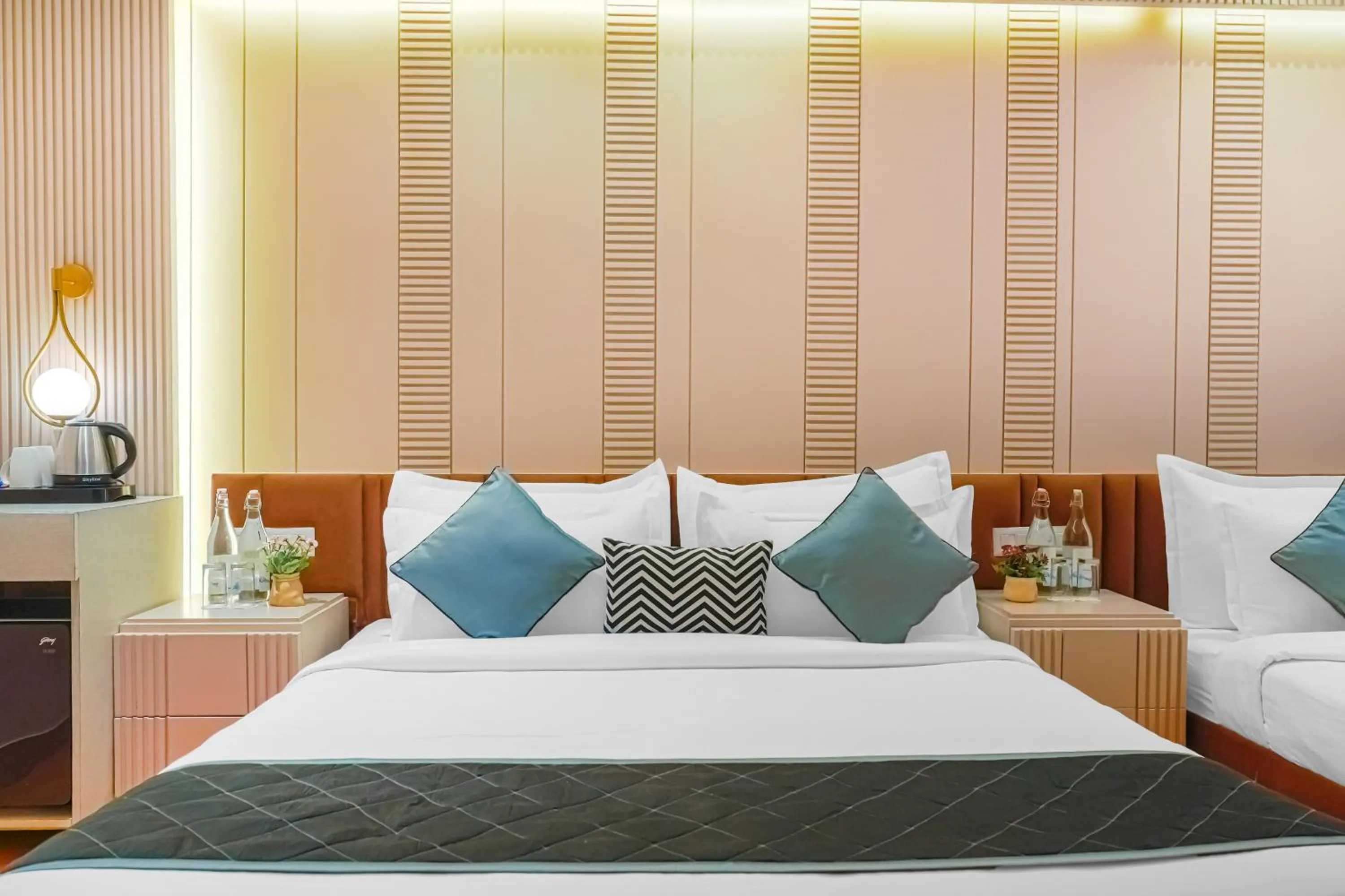 Bed in Quality Inn Elite Levelup Boutique