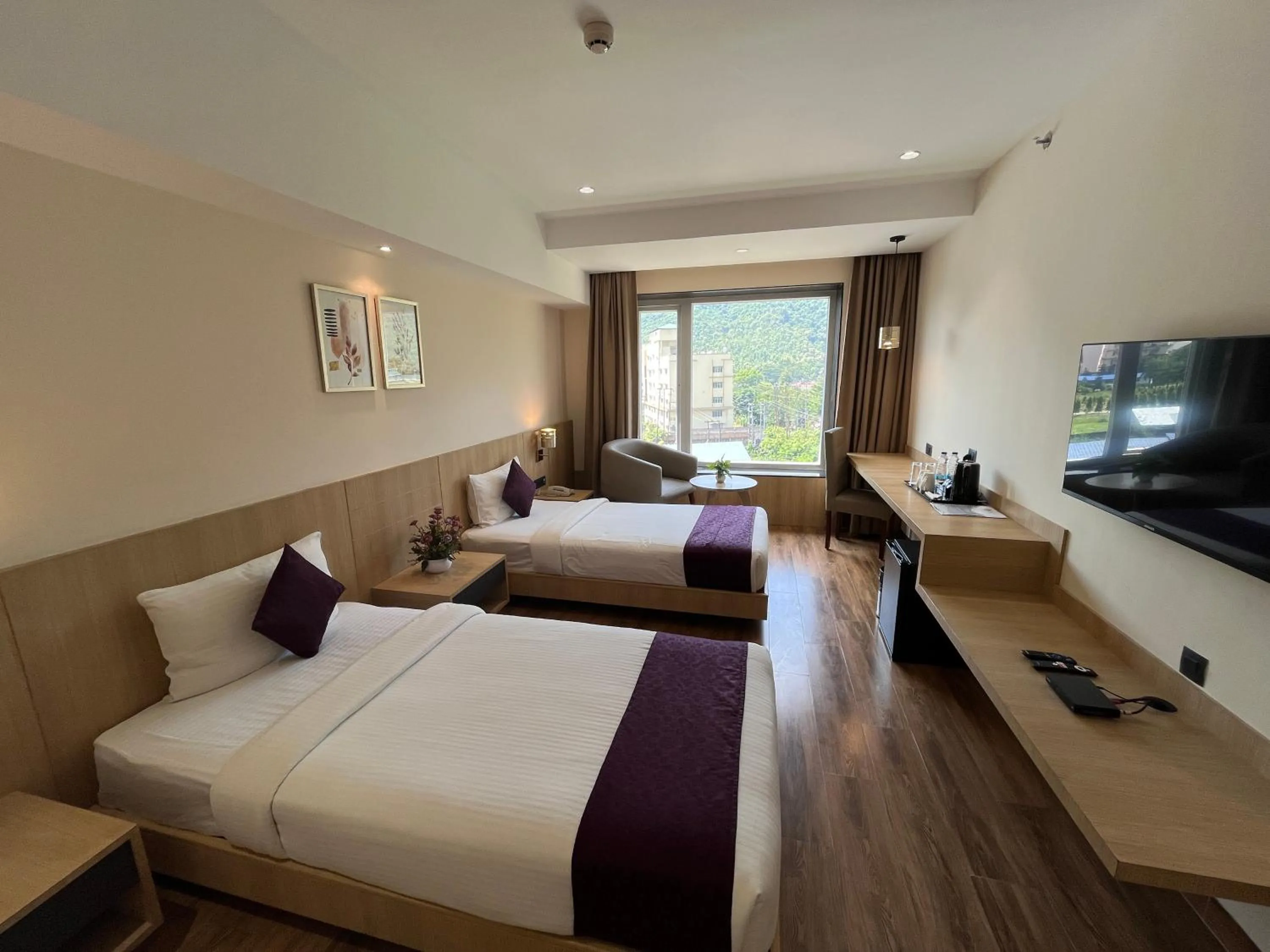 Bedroom, Bed in Sachika Hotels, Guwahati