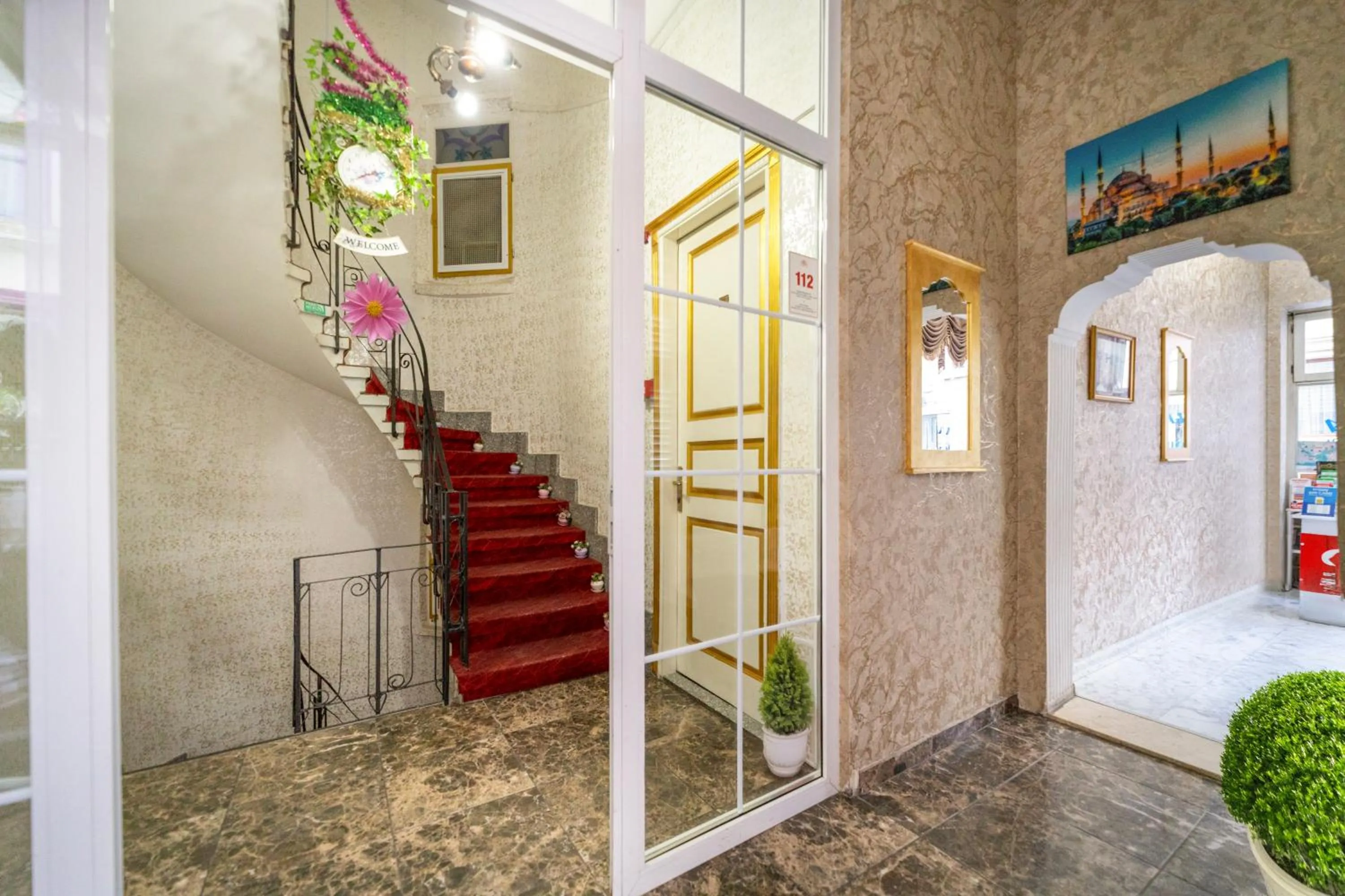 Facade/entrance in Alhambra Apart Hotel