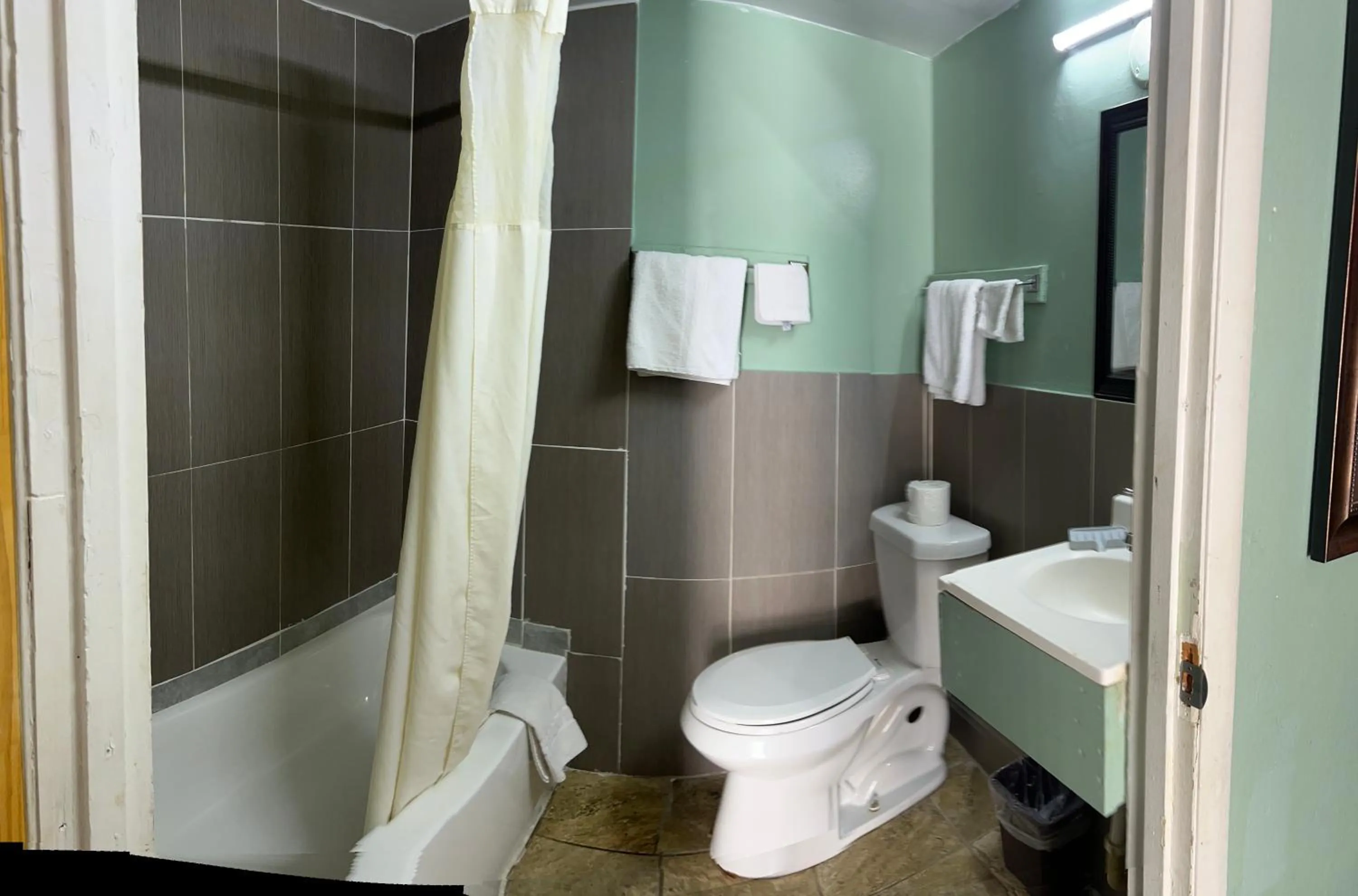 Toilet in Town & Country Motel