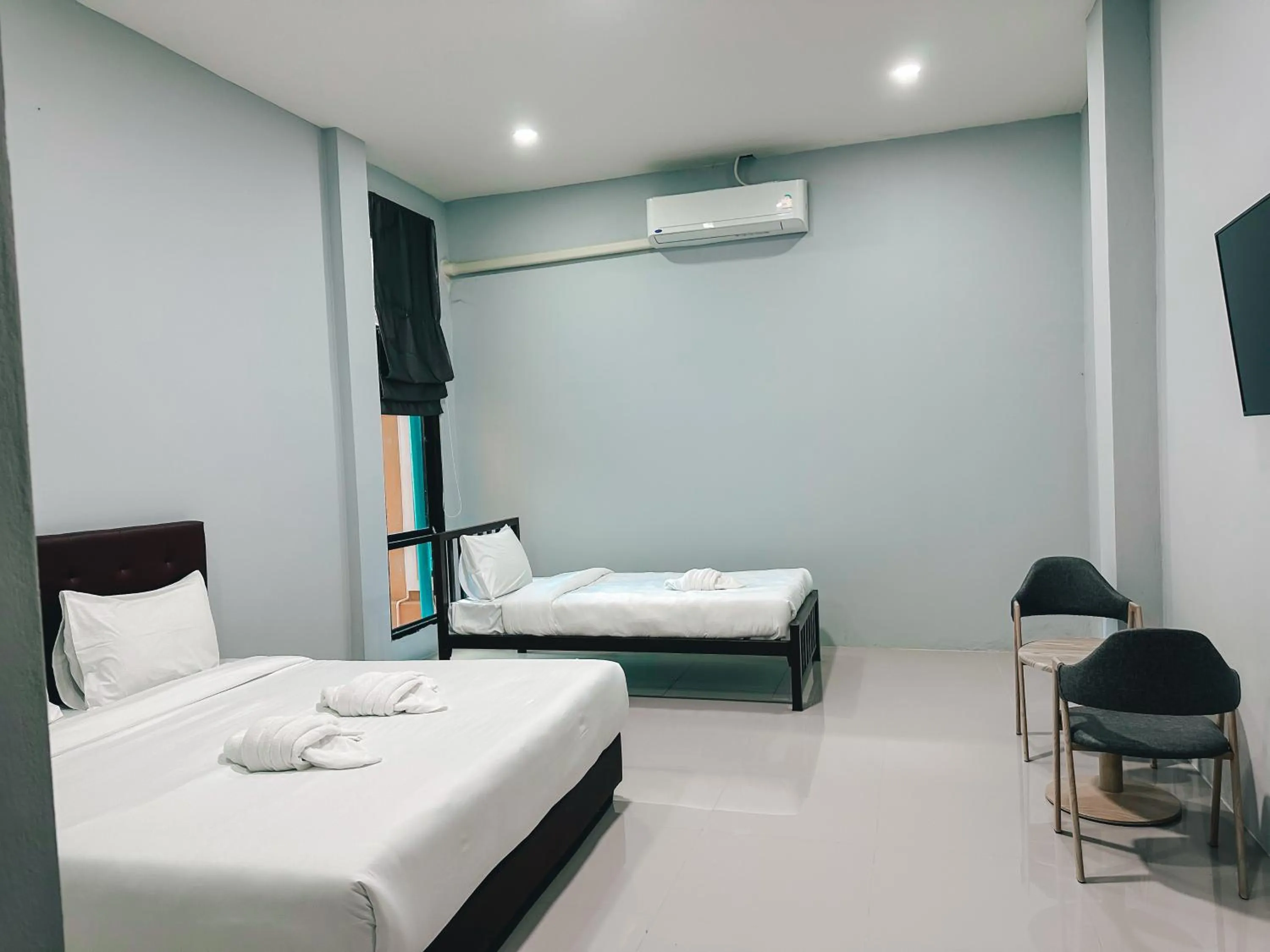 Bed in Tuscany Hotel Buriram