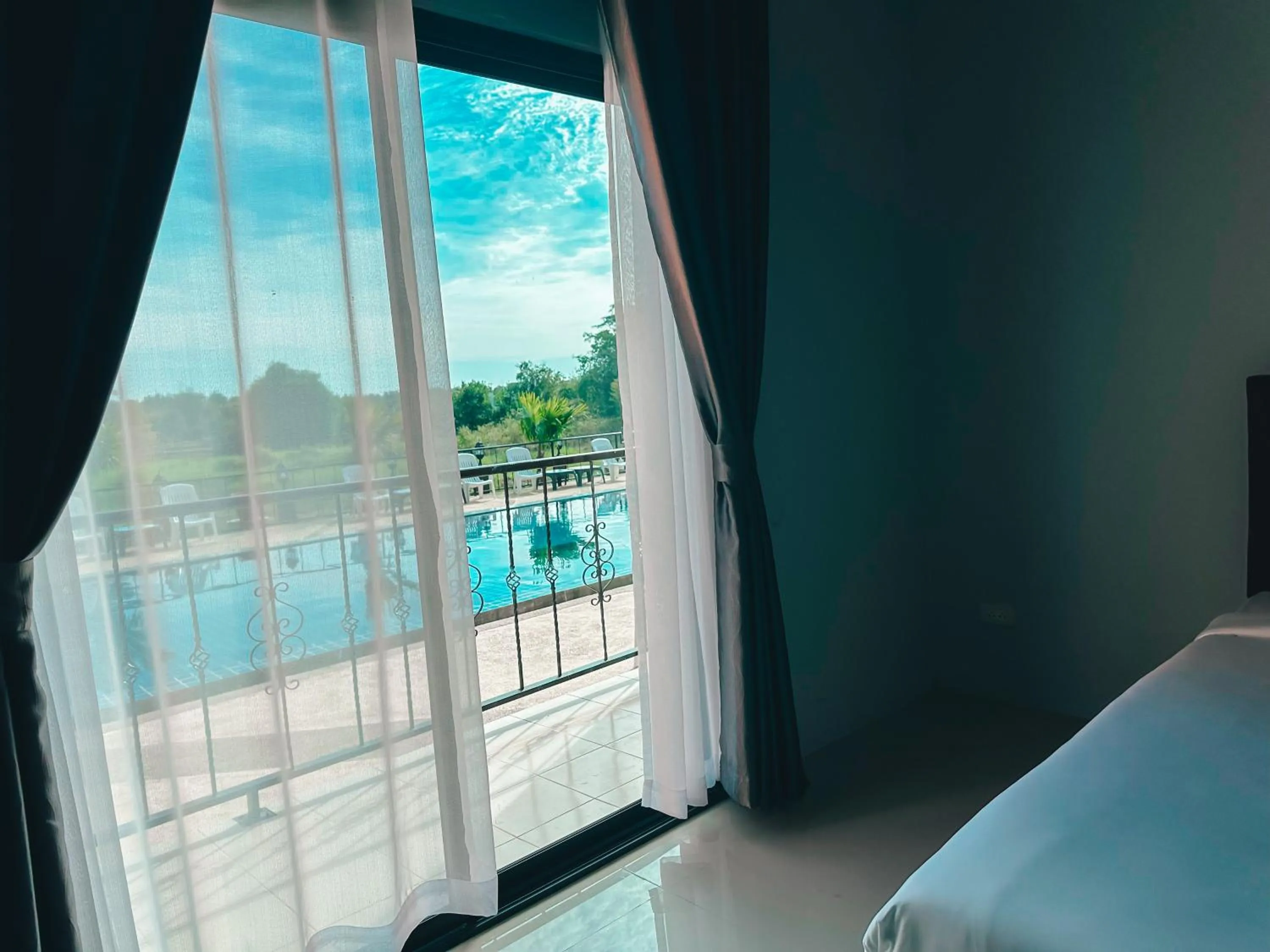 Pool view, Bed in Tuscany Hotel Buriram