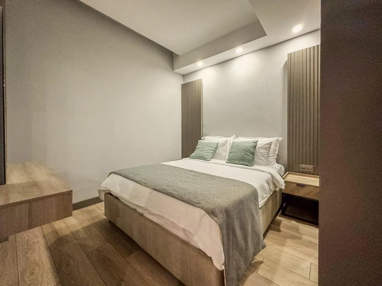 Bed in Leaf River Suites