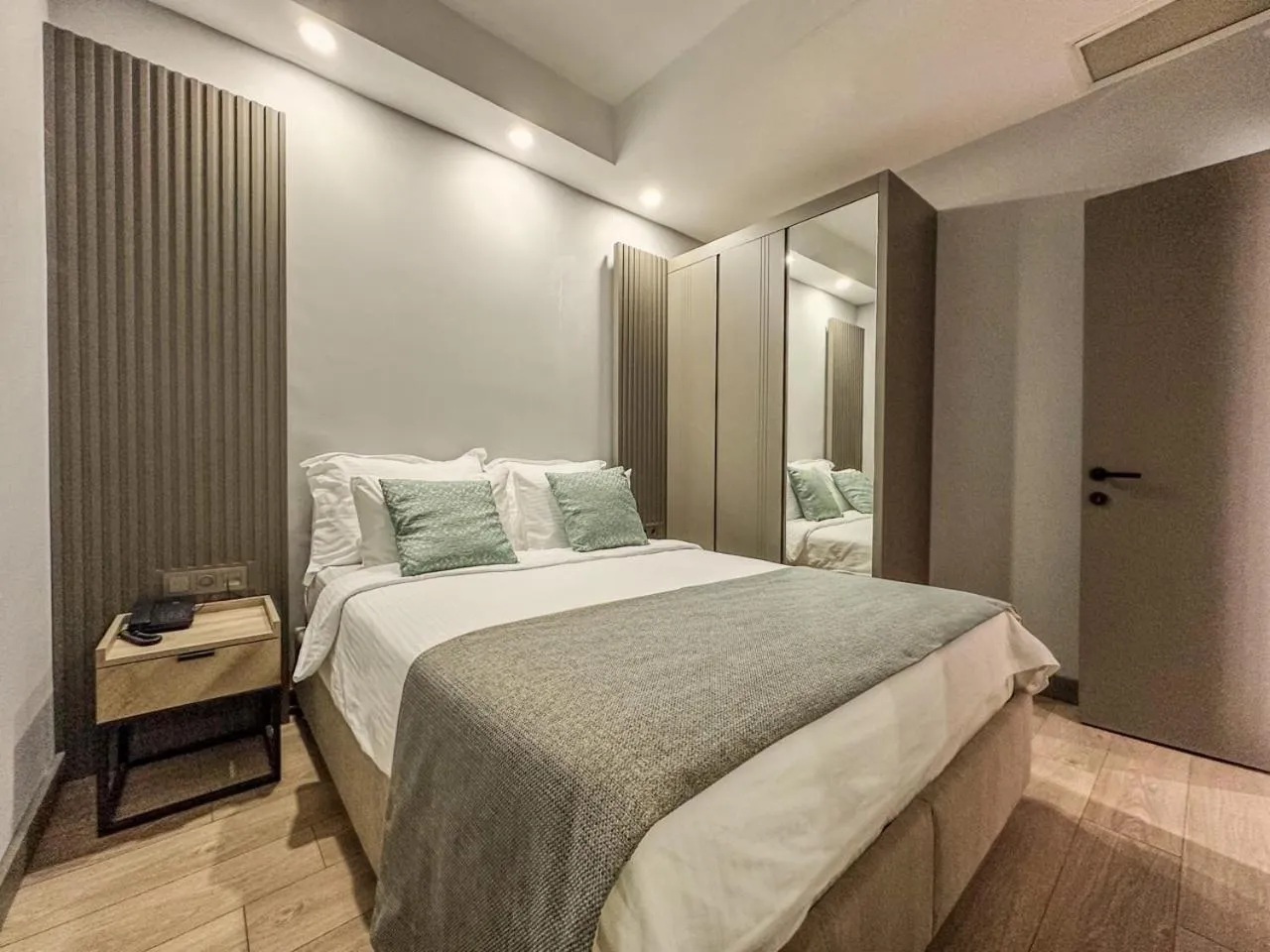 Bed in Leaf River Suites