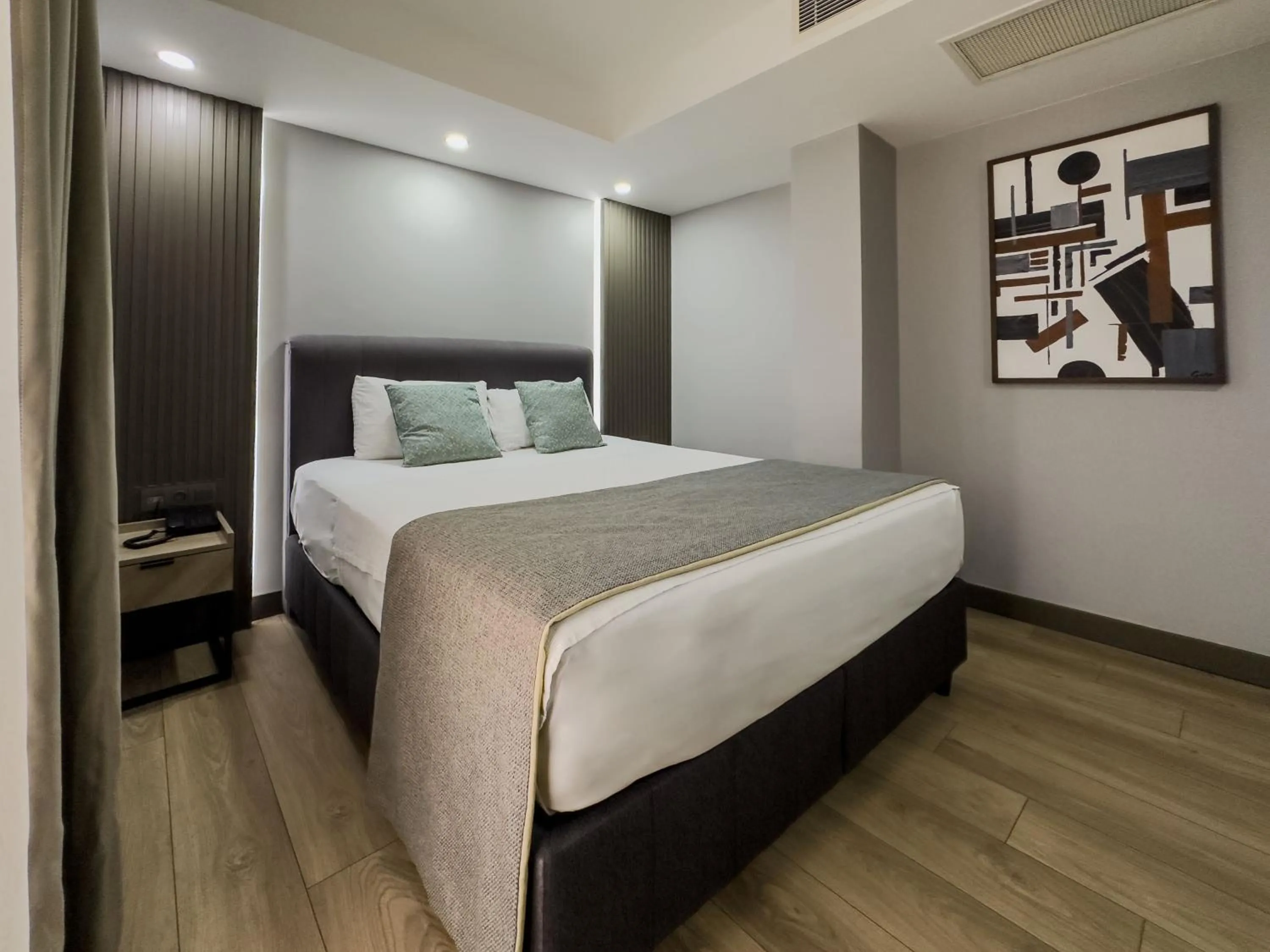 Bed in Leaf River Suites