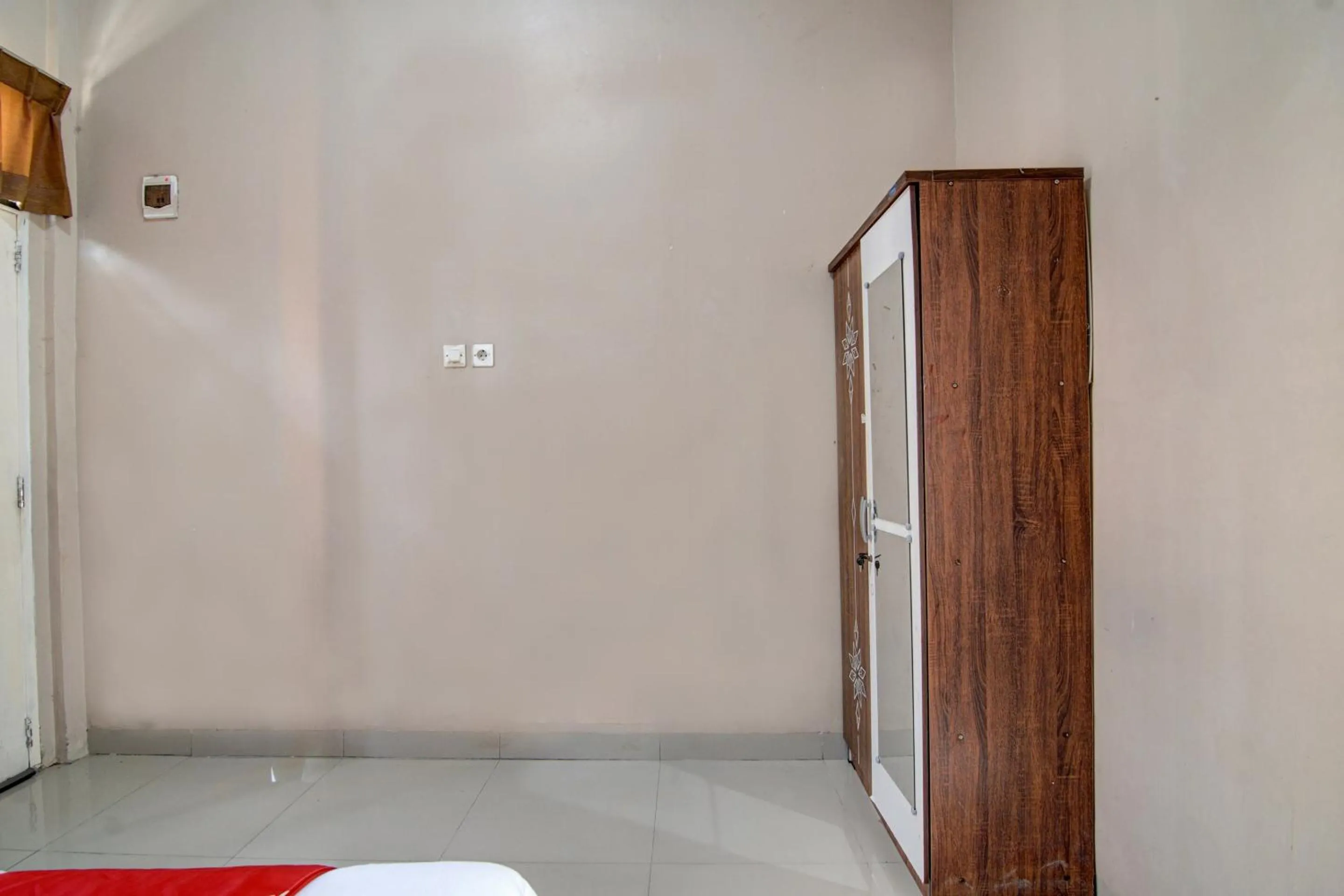 Bedroom in OYO 92806 Penginapan Geby Syariah