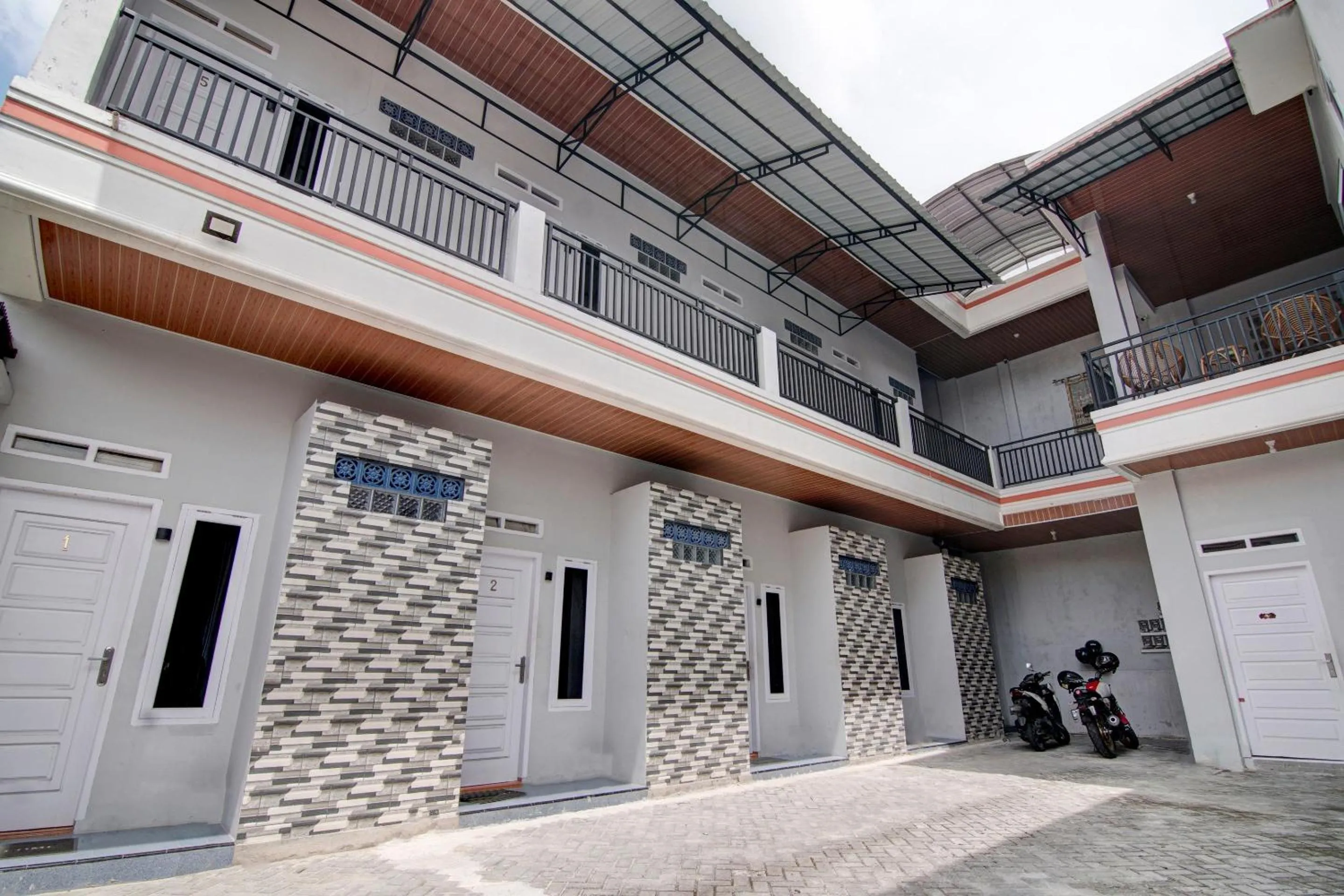 Facade/entrance in OYO 92806 Penginapan Geby Syariah