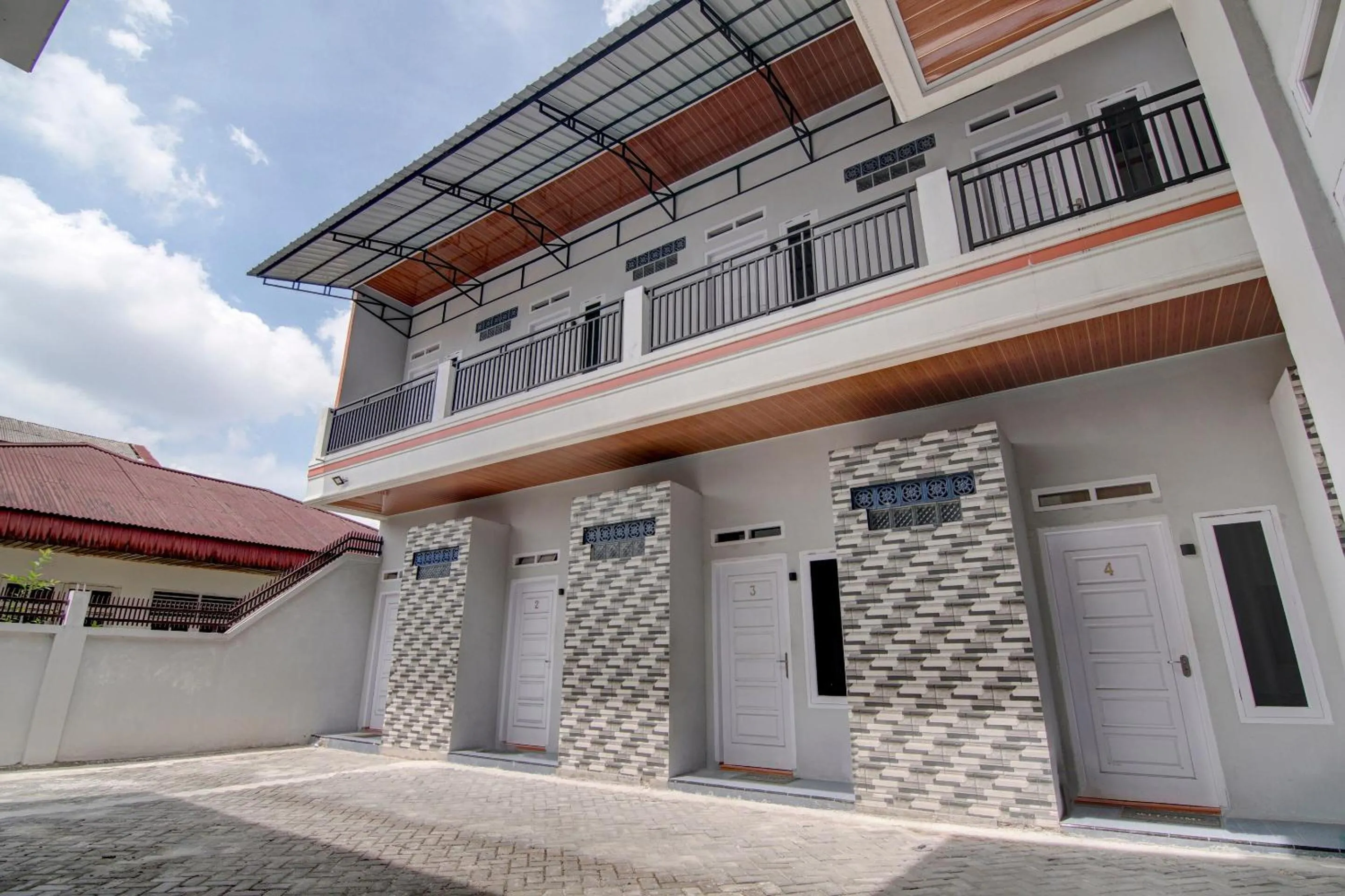 Facade/entrance in OYO 92806 Penginapan Geby Syariah