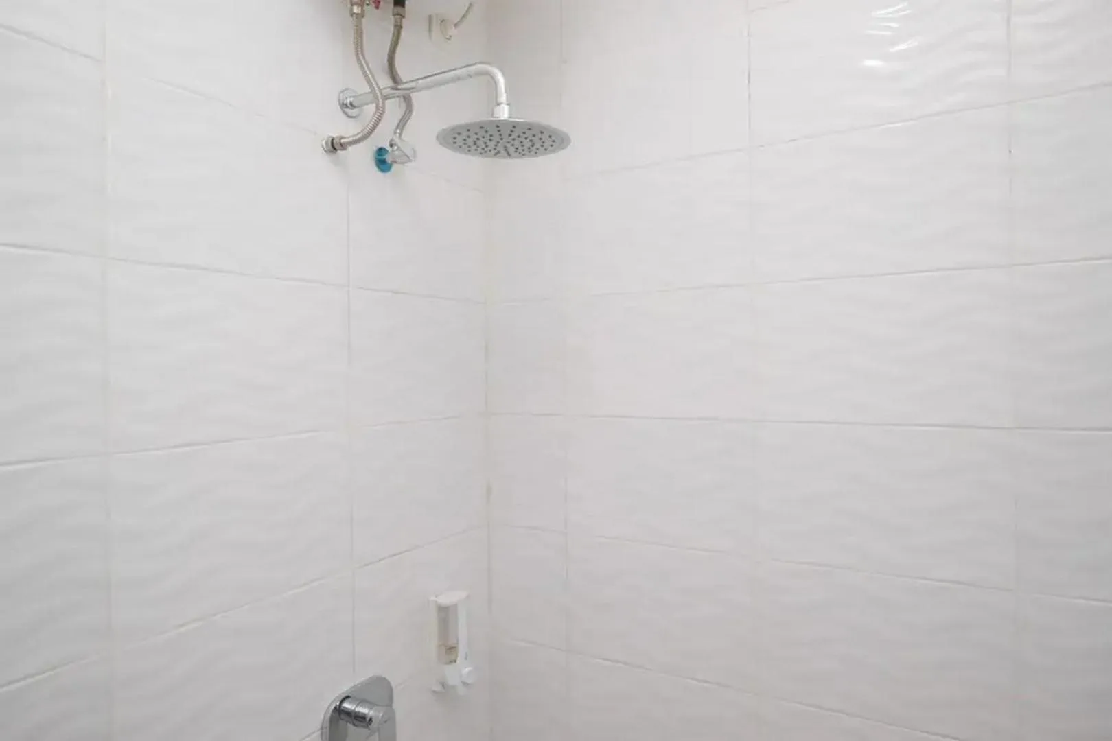 Bathroom in Sans Hotel City Park Medoho Semarang