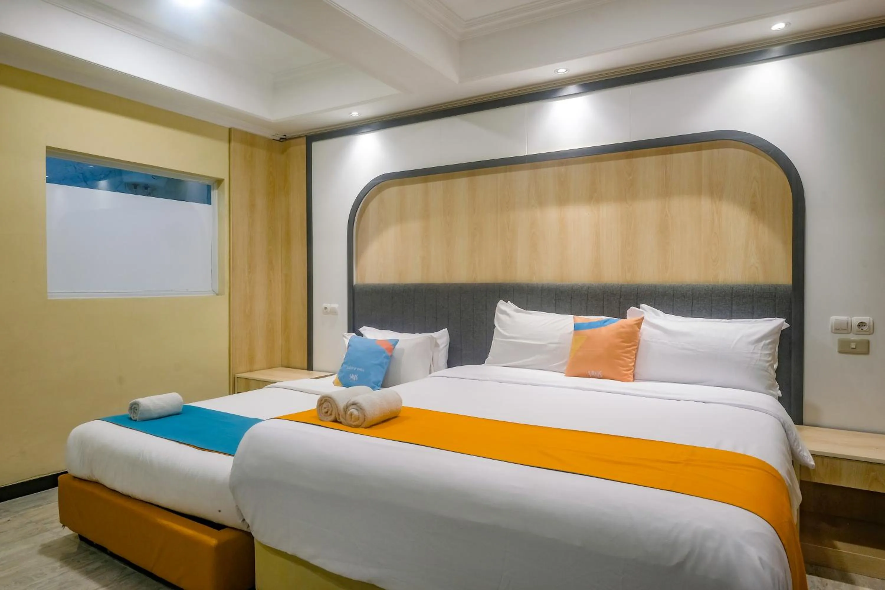 Bed in Sans Hotel City Park Medoho Semarang