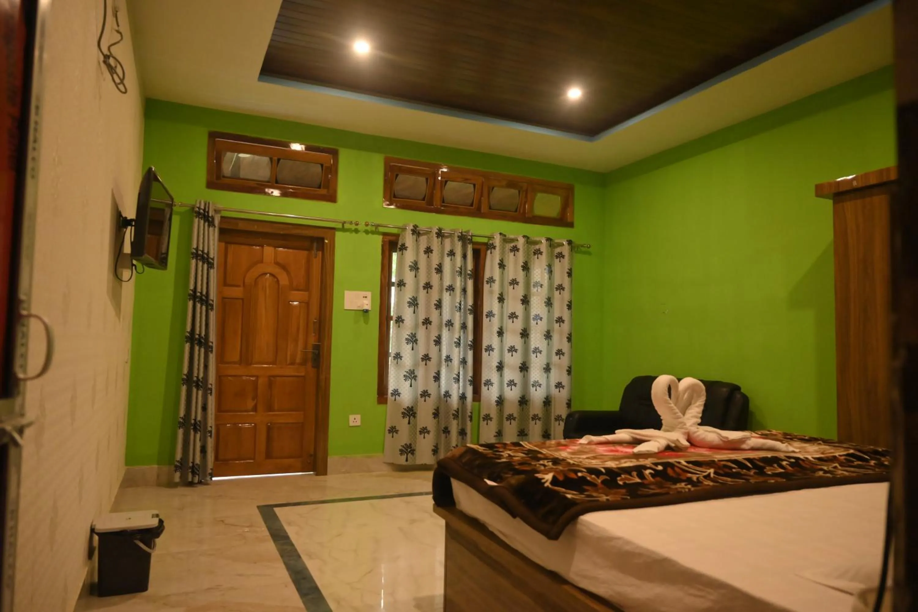 Bed in De Aloha Resort