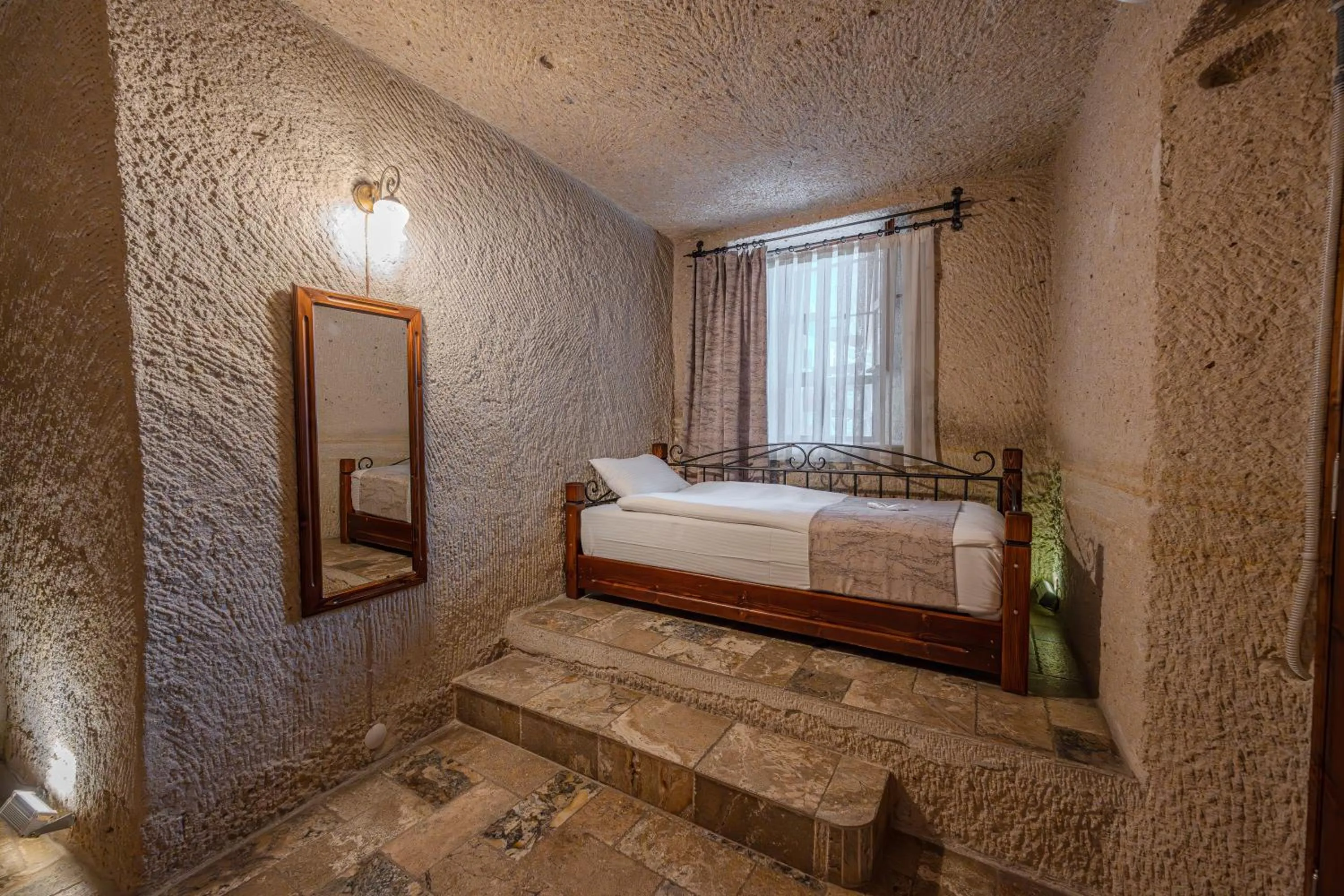 Bed in Osmanbey Cave House