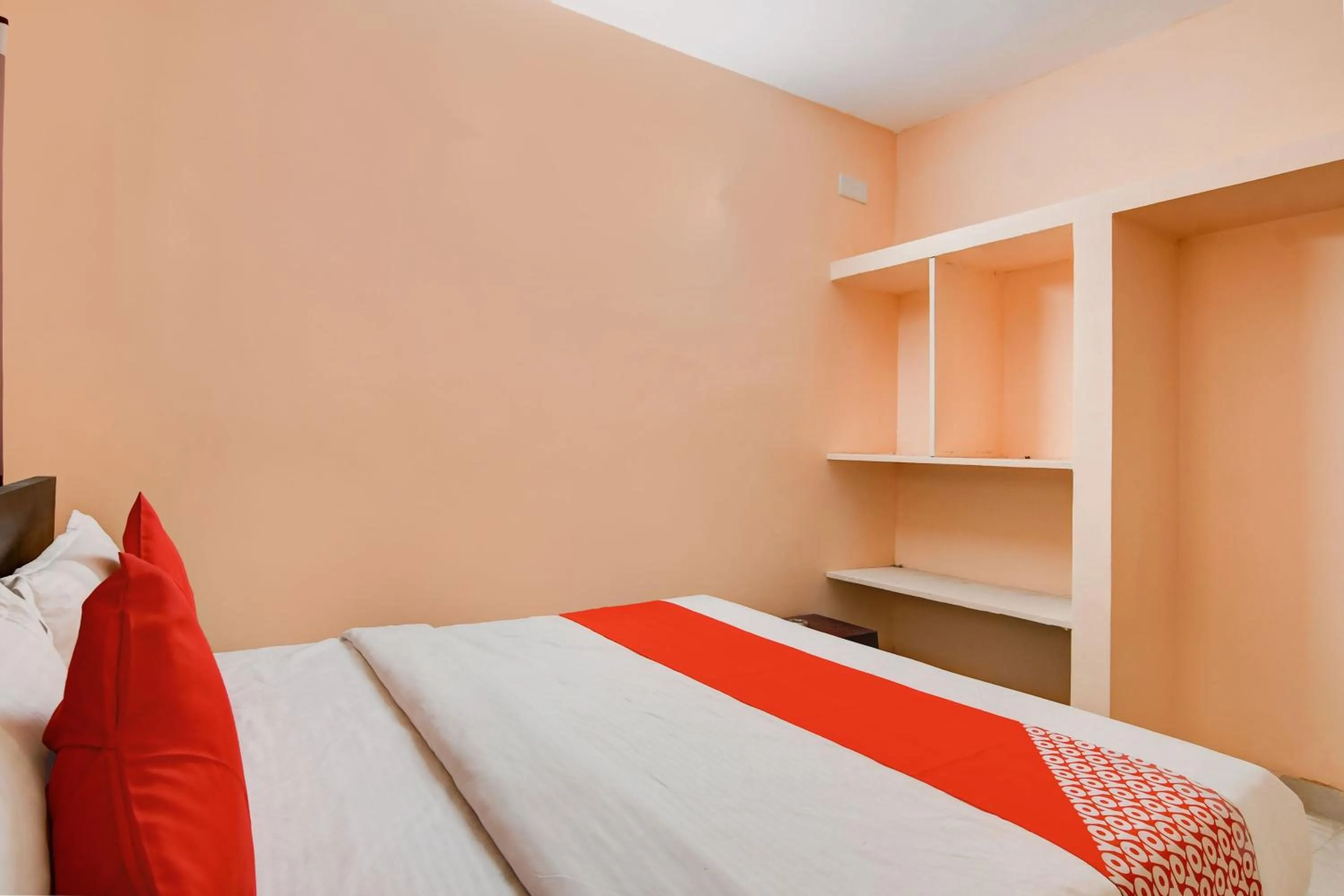 Bedroom in Hotel O Flagship S S Guesthouse