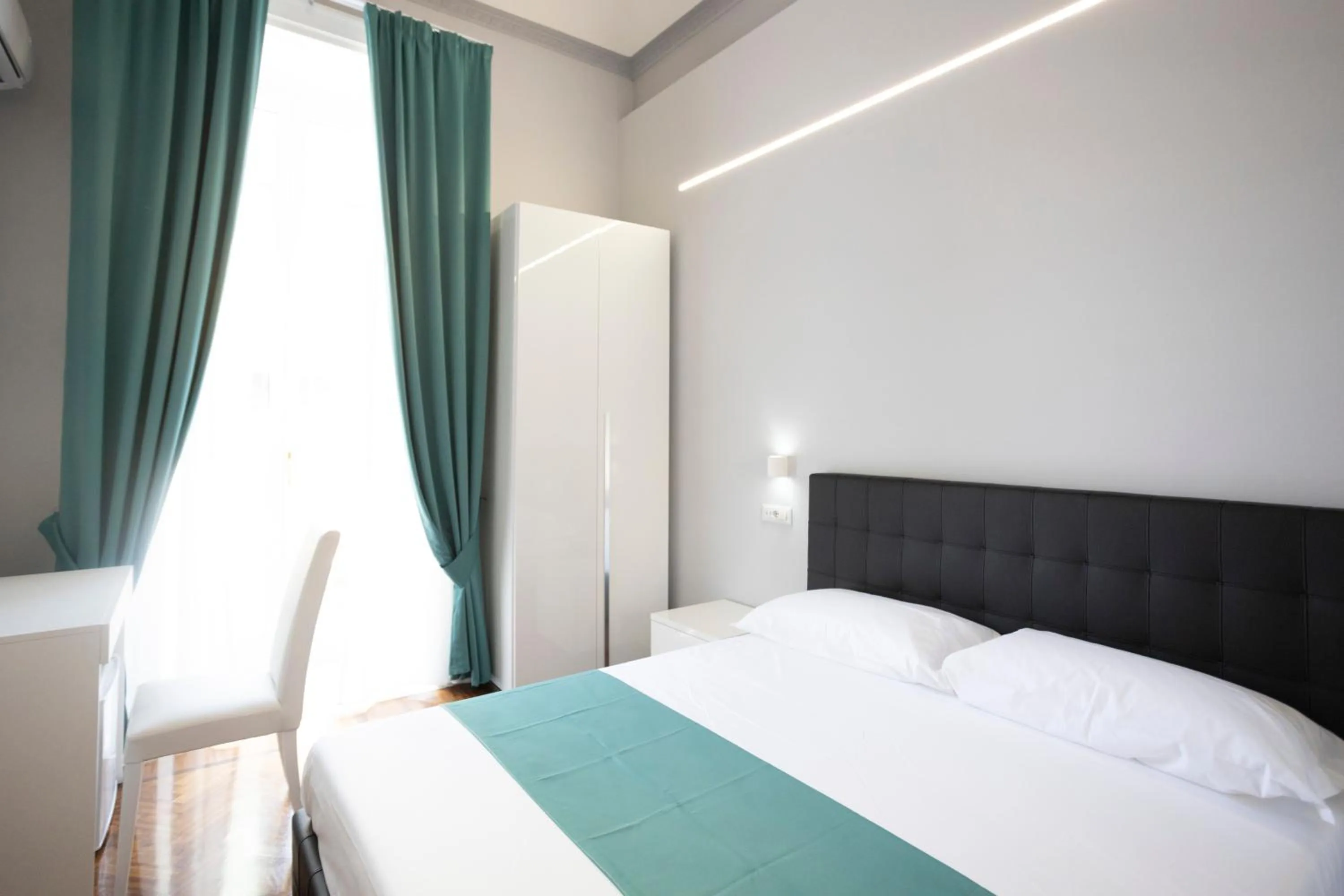 Photo of the whole room, Bed in La Chambre Duomo