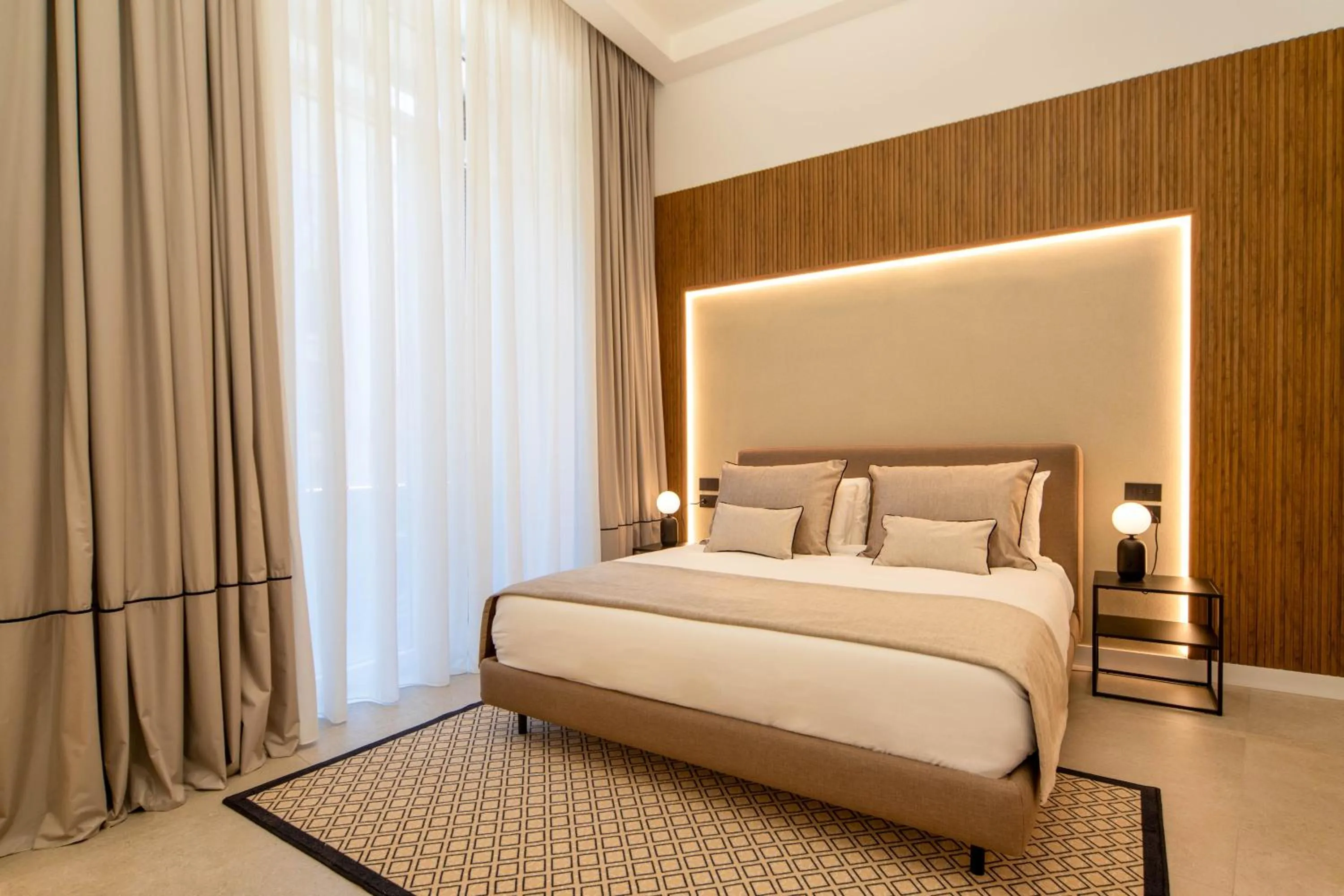 Bed in MAMALU - Studios and Suites