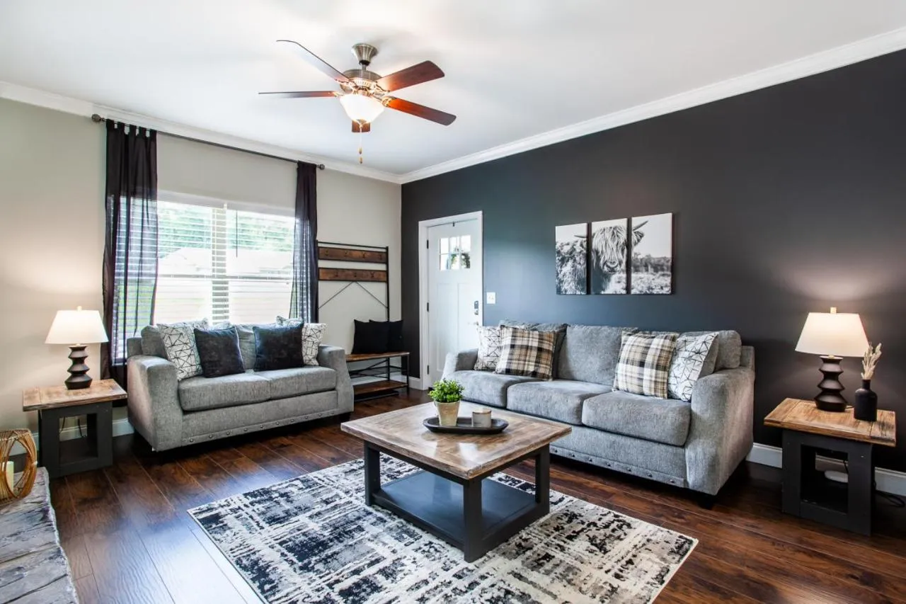 Seating area in Elegant End Condo Fireplace Community Amenities