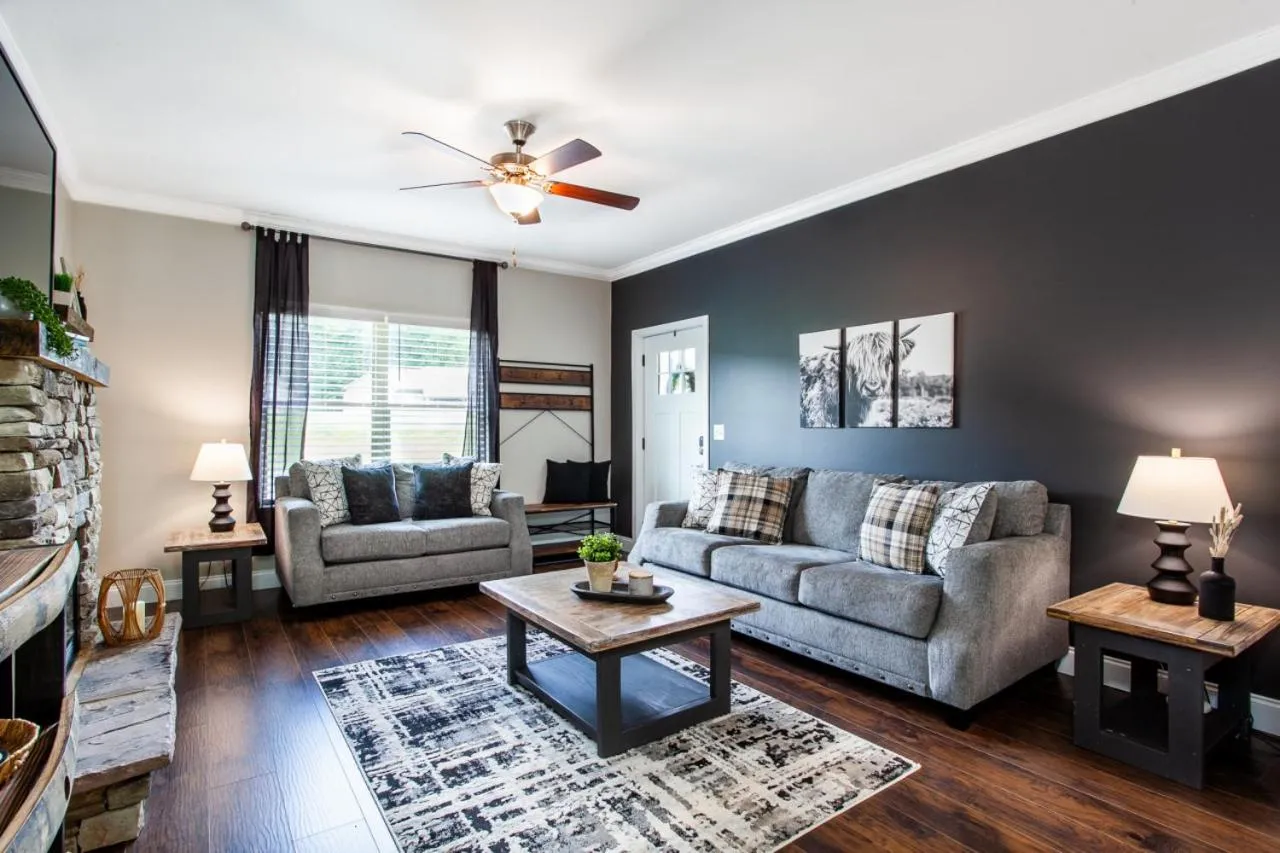 Seating area in Elegant End Condo Fireplace Community Amenities