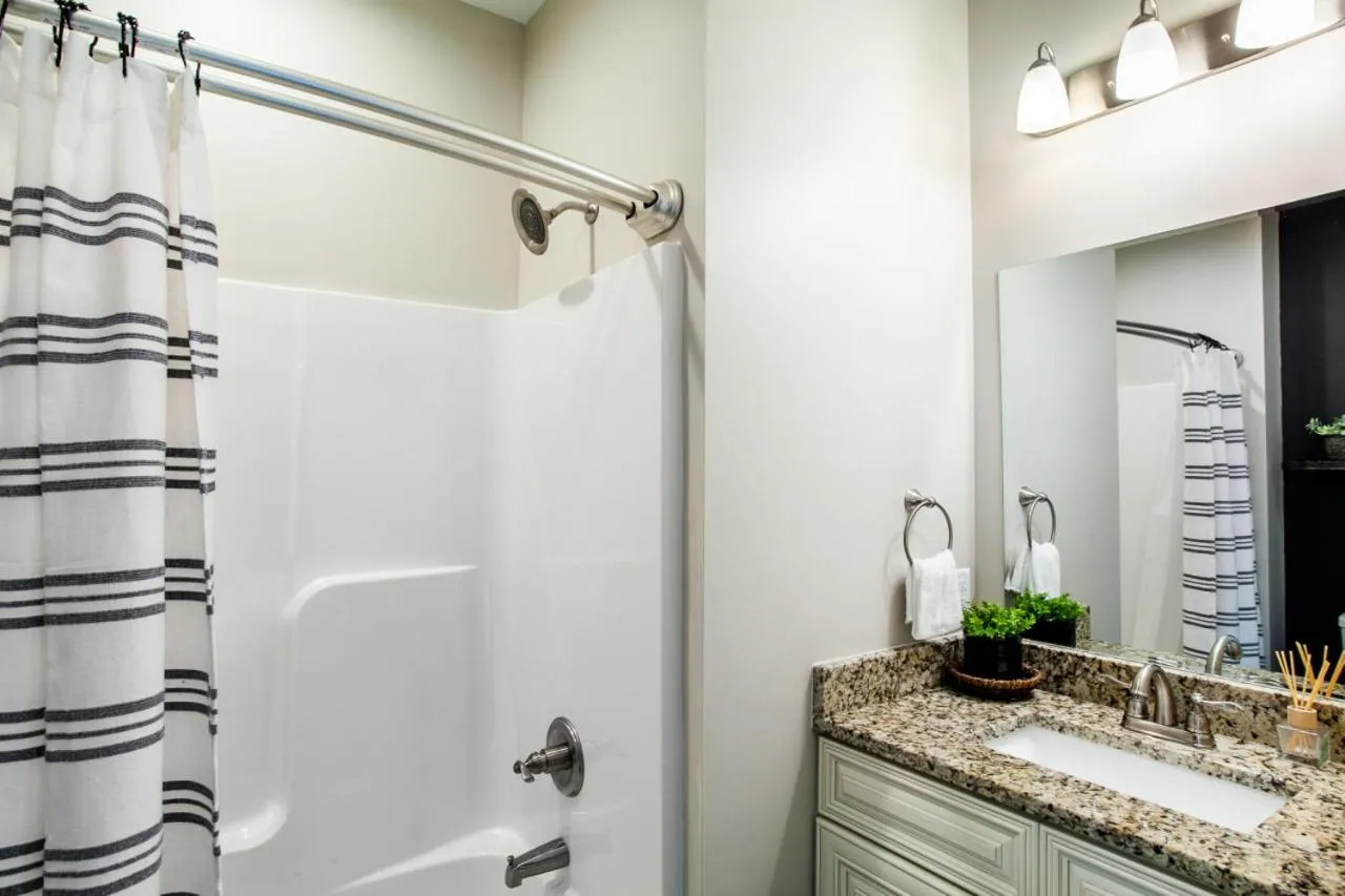 Bathroom in Elegant End Condo Fireplace Community Amenities