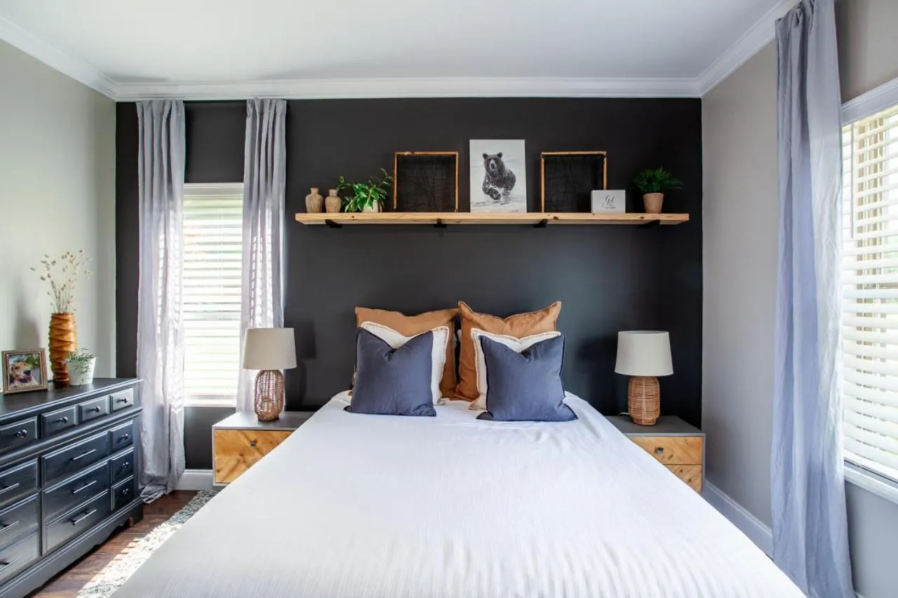 Bed in Elegant End Condo Fireplace Community Amenities