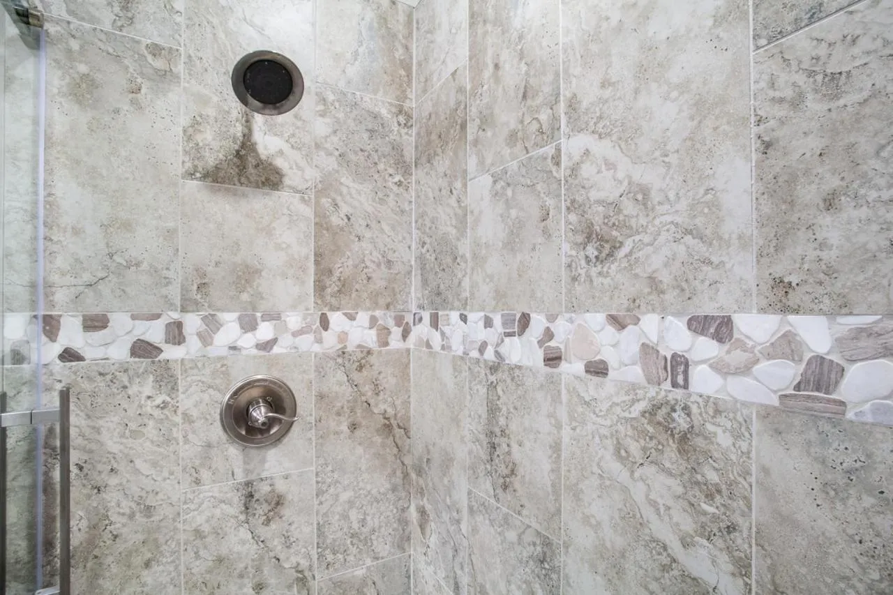 Bathroom in Elegant End Condo Fireplace Community Amenities