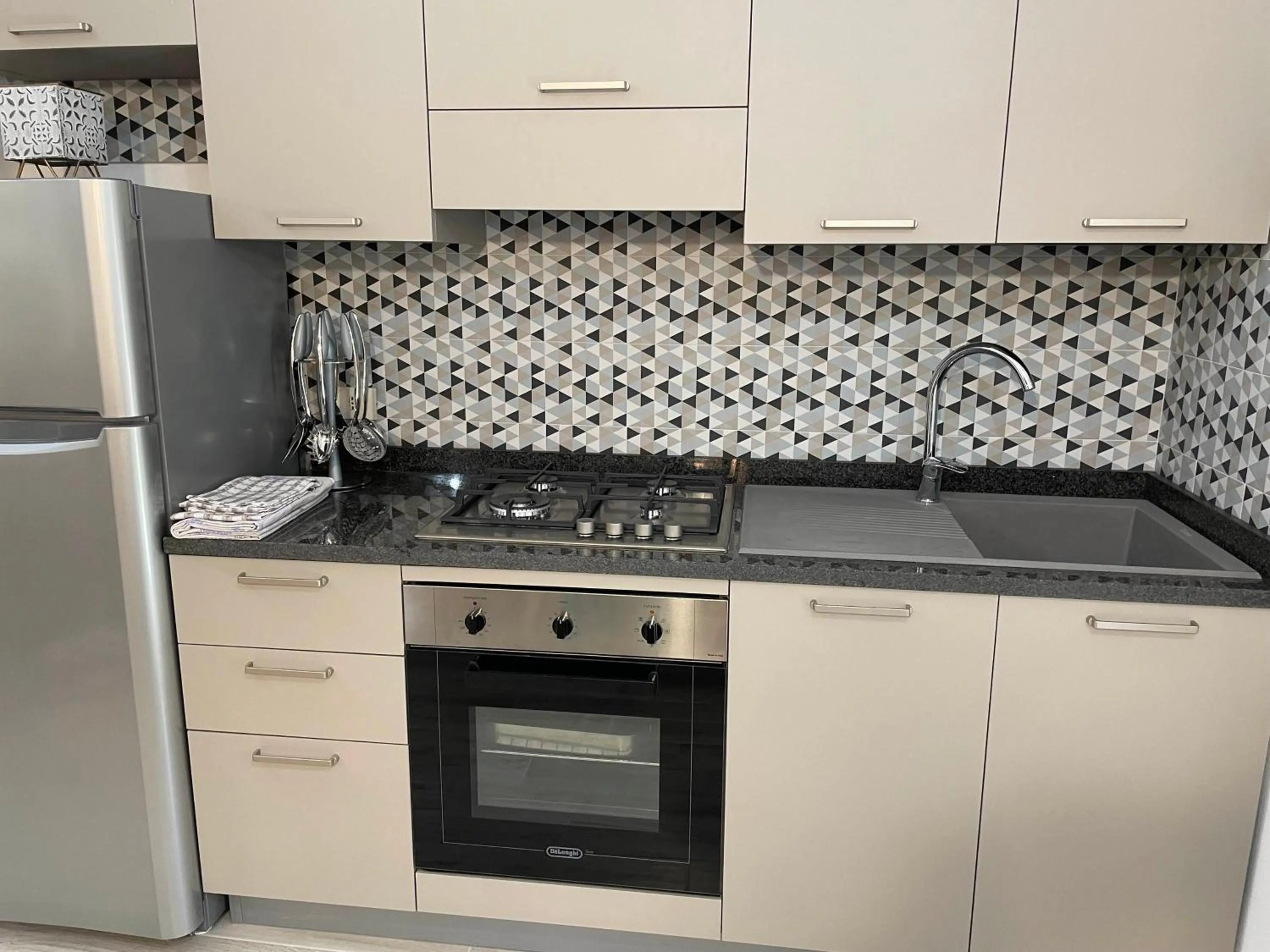 Kitchen or kitchenette in Casa Vacanza Le Case