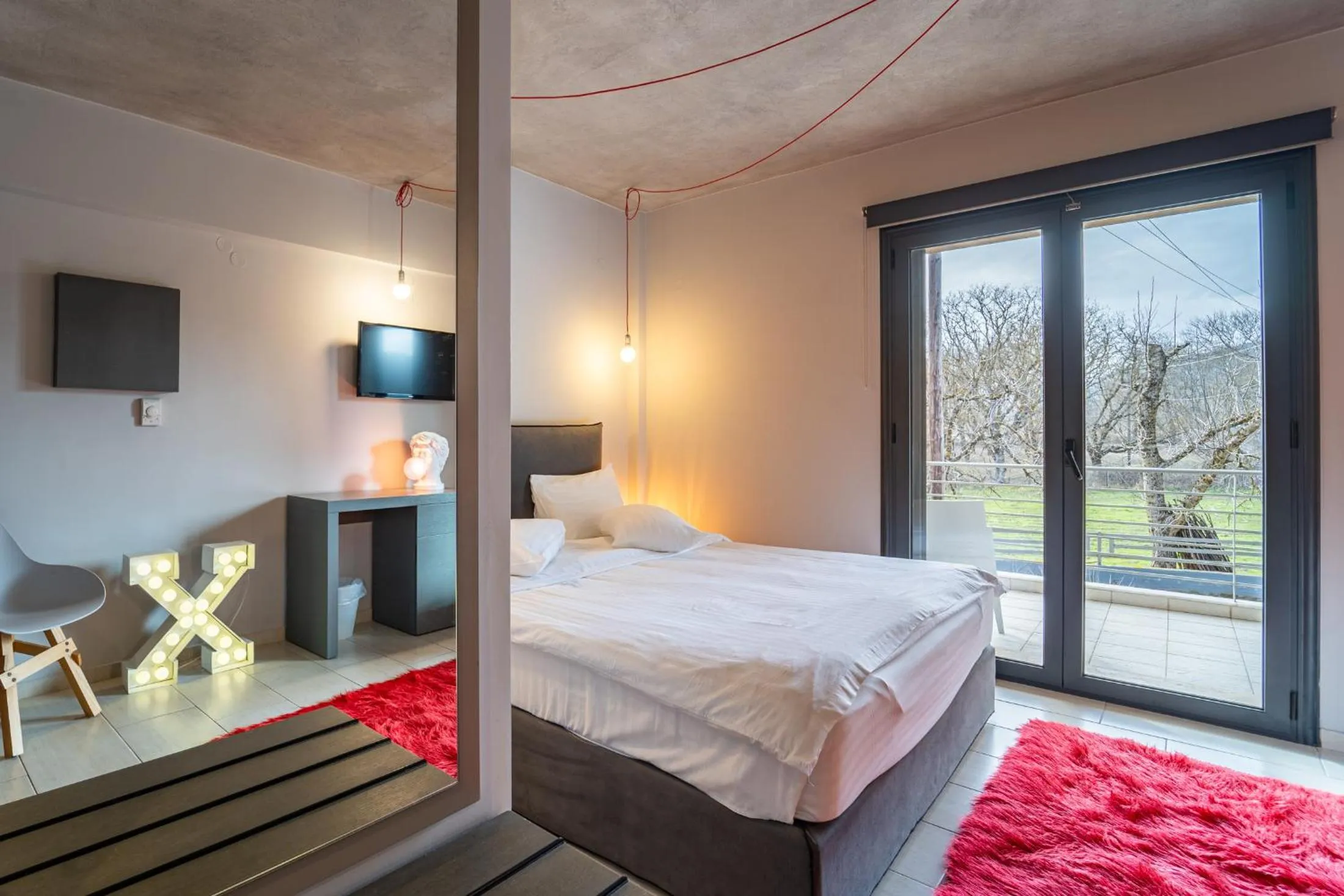 Bed in Oniropetra Boutique Hotel