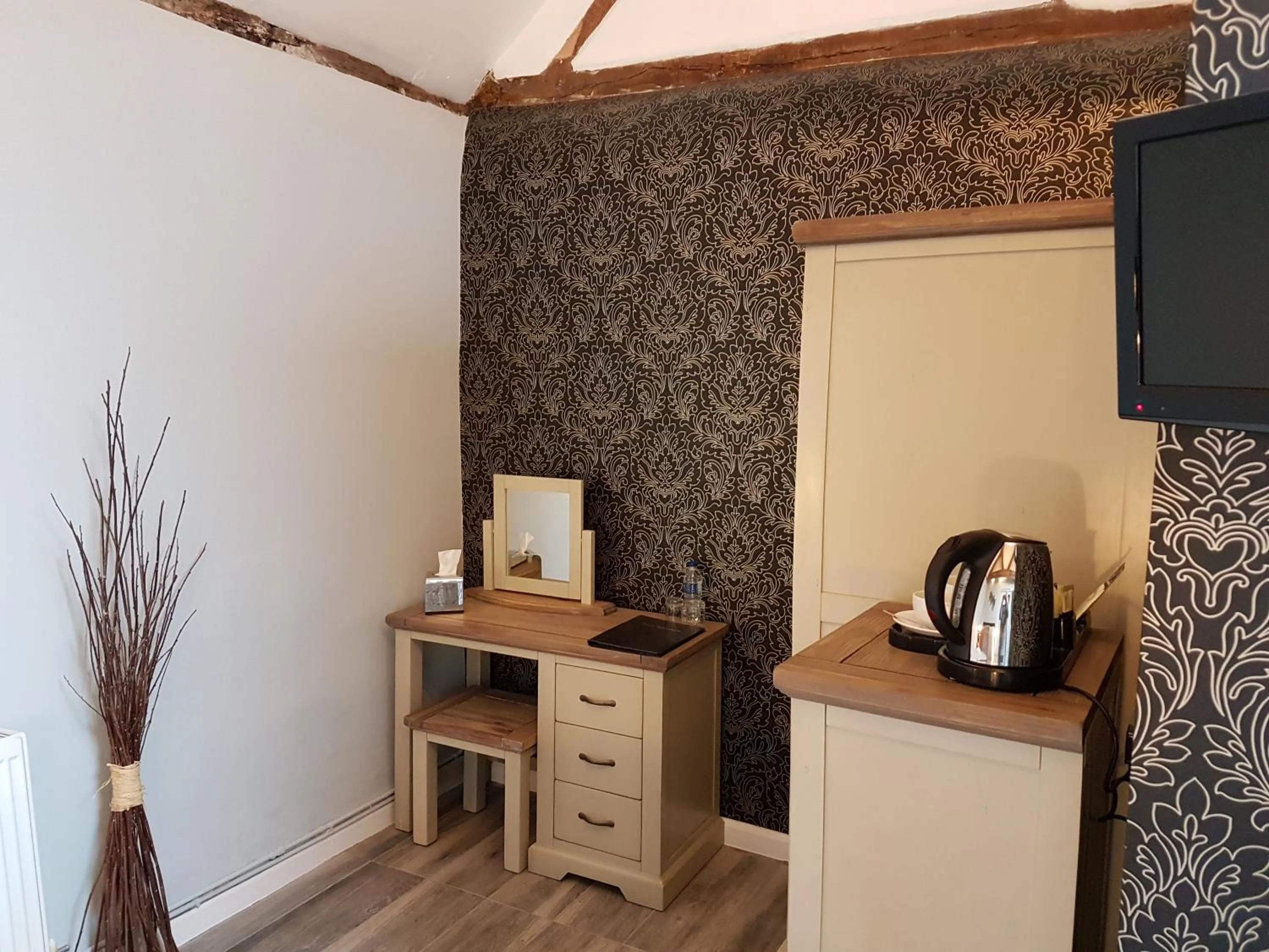 Coffee/tea facilities in Curly Tail Accommodation