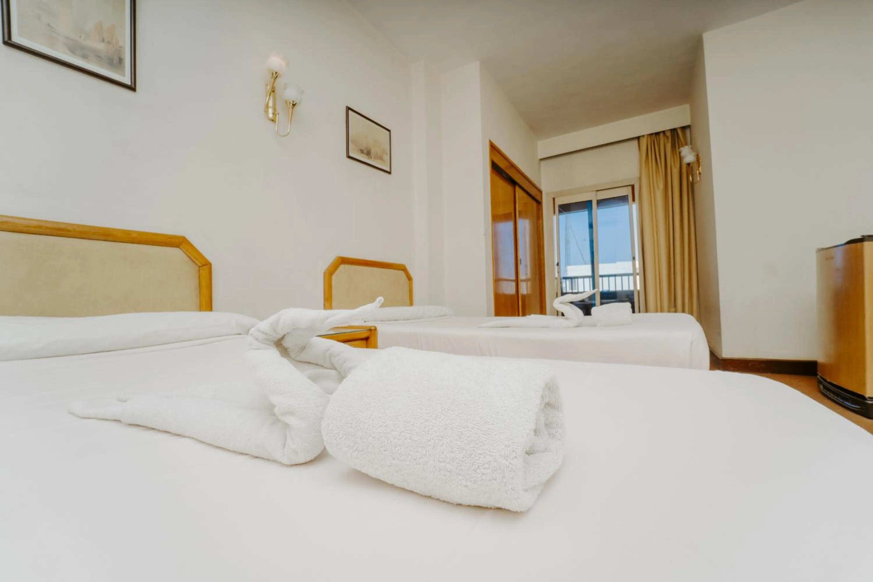 Bed in Queens Valley Hotel