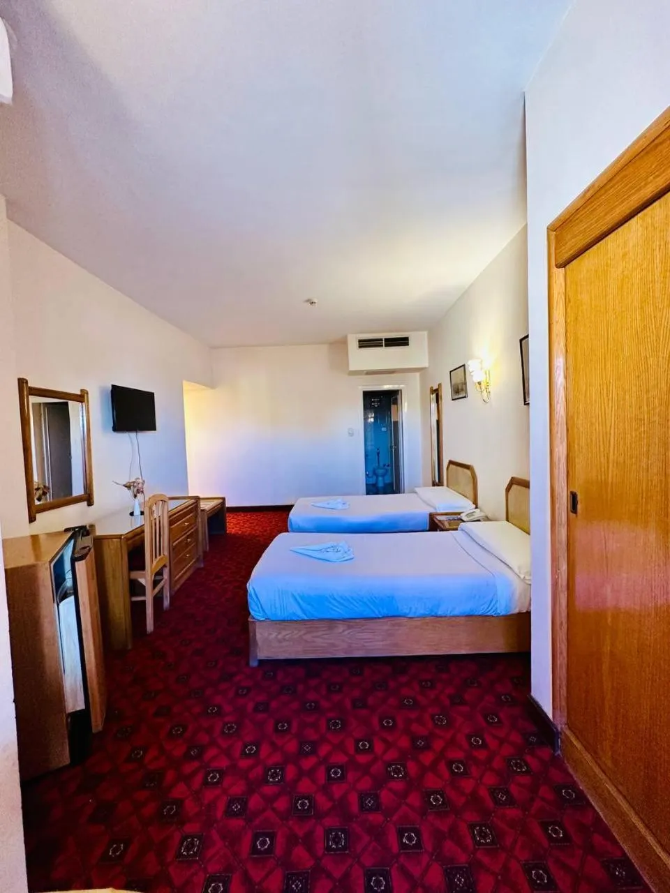 Bed in Queens Valley Hotel