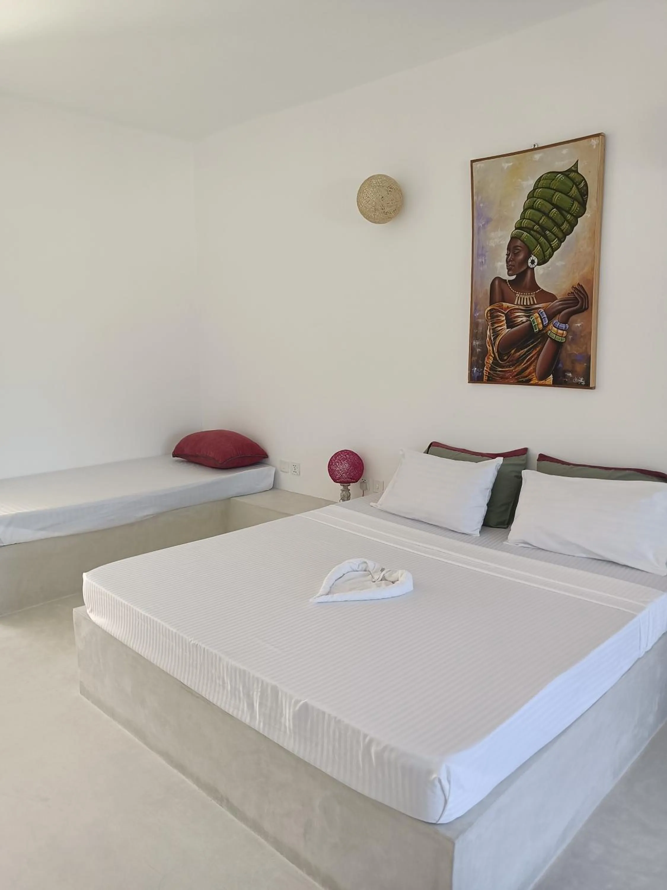 Bed in Ascot Watamu Resort