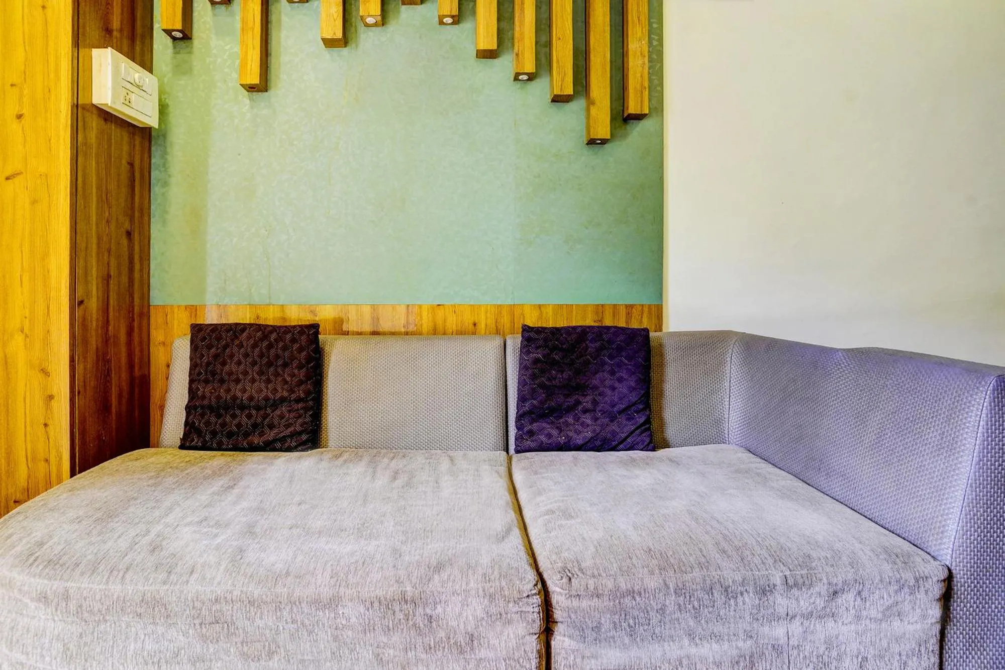 Seating area, Bed in Via Sumit Palace