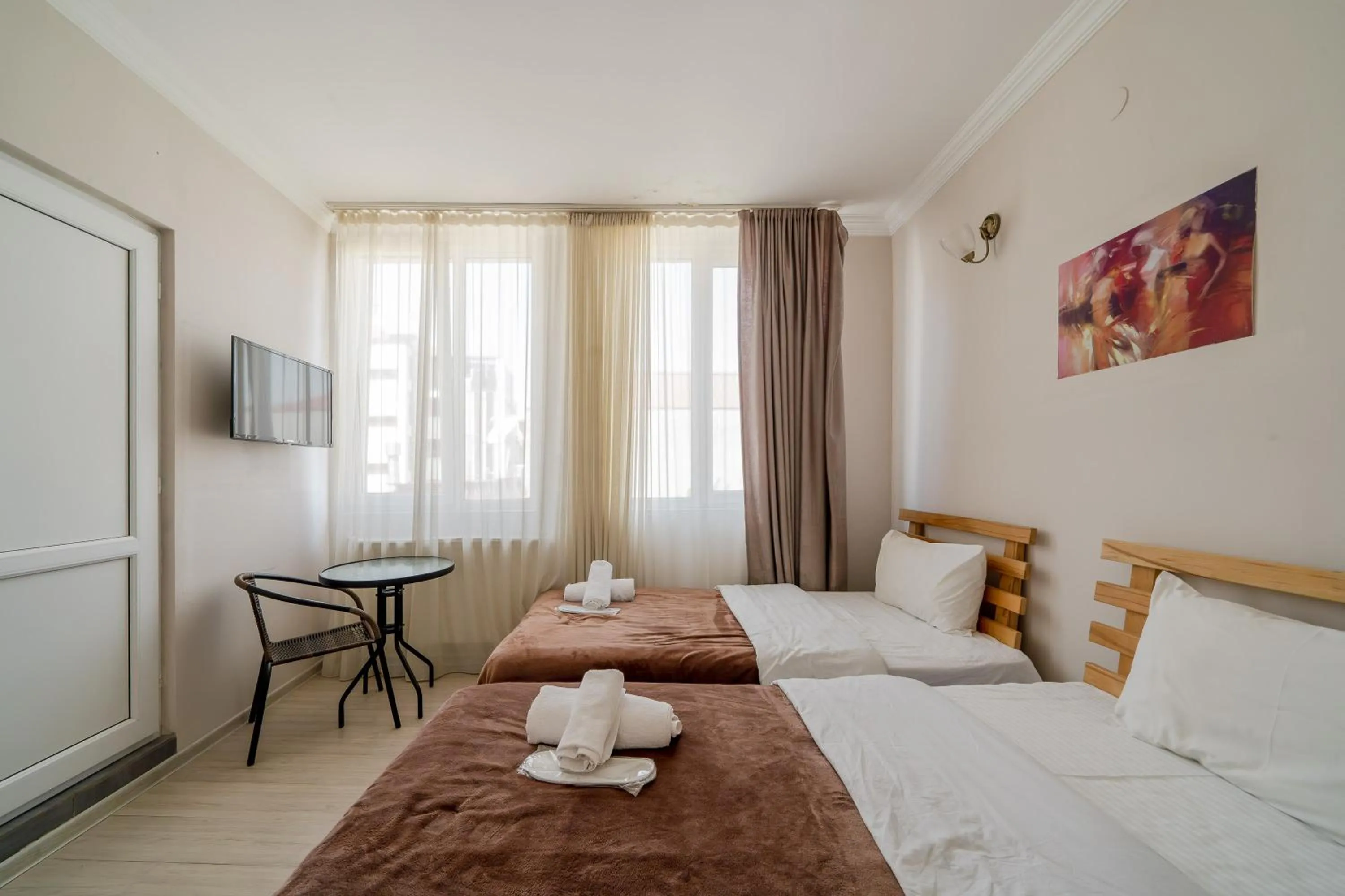 Bed in Hotel Tato & CoWorking space