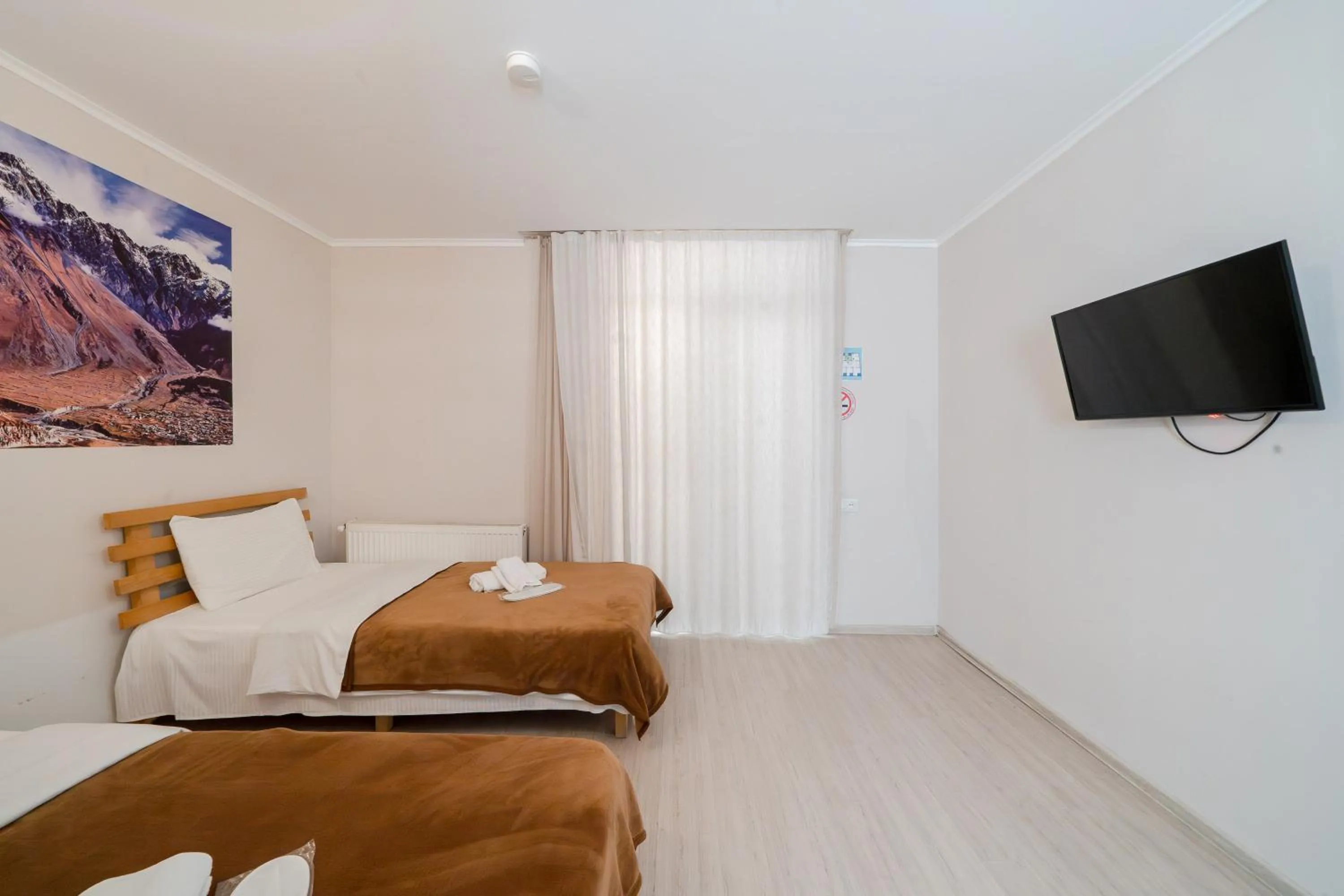 Bed in Hotel Tato & CoWorking space