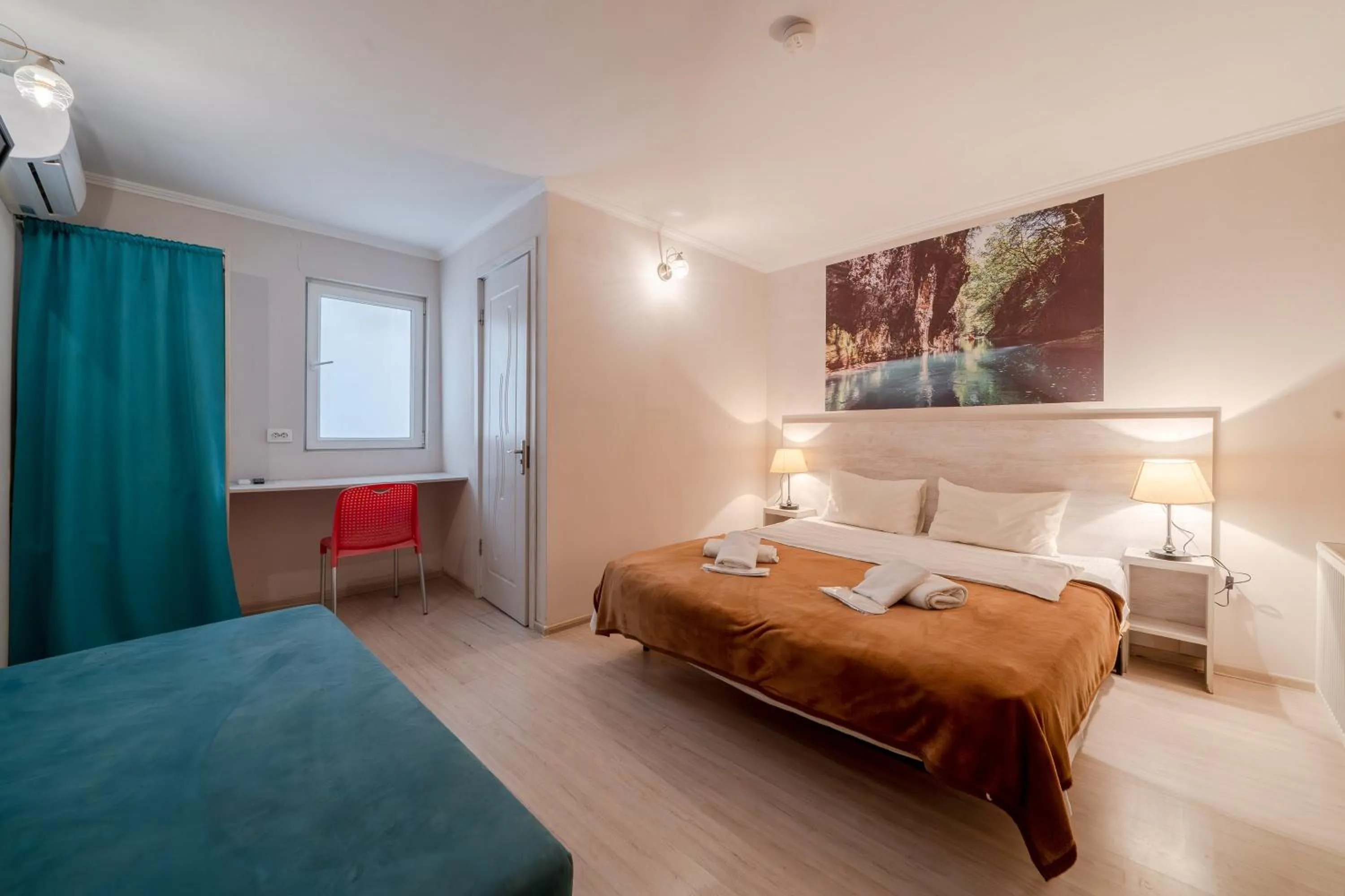 Bed in Hotel Tato & CoWorking space