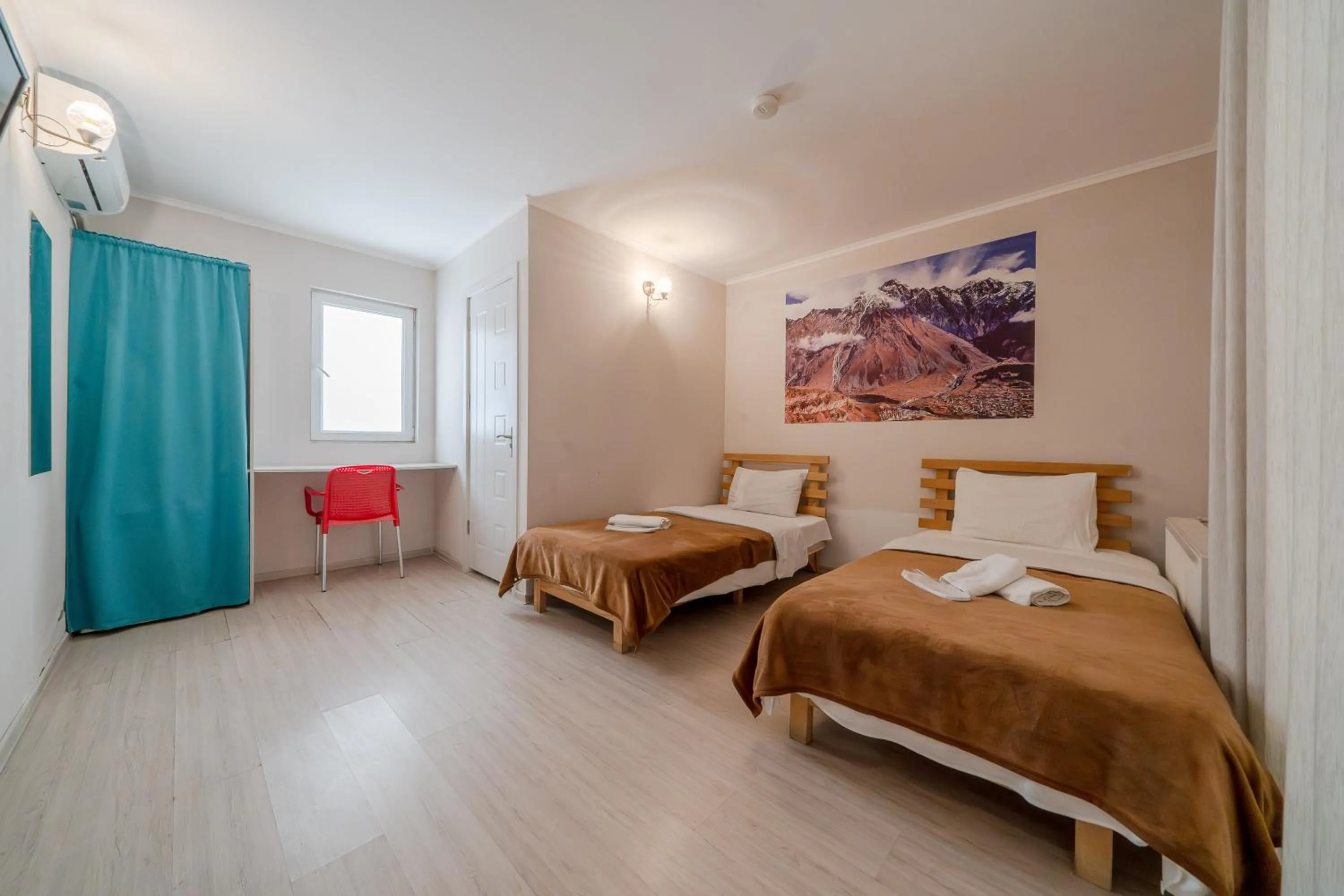 Bed in Hotel Tato & CoWorking space